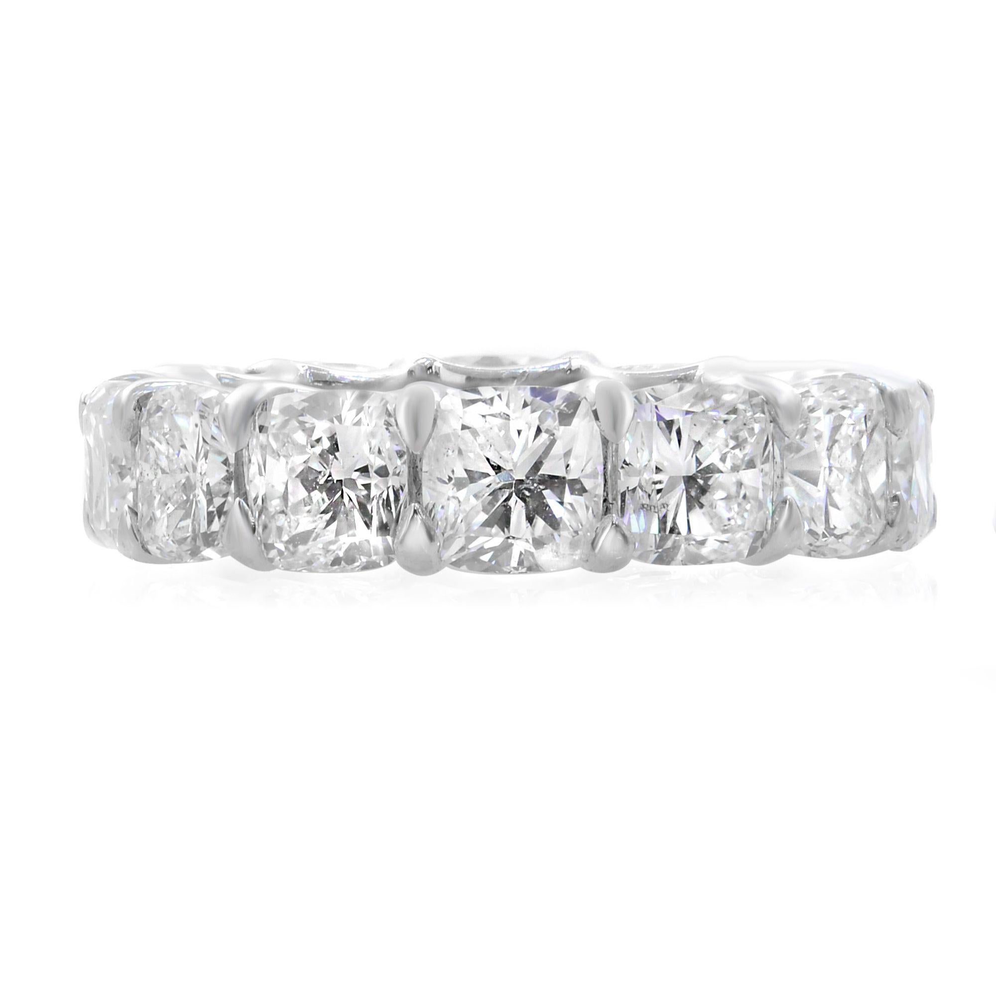This beautiful eternity band ring is set with 14 perfectly matched cushion cut diamonds, each weighing between 0.52 carat. Each stone is F-G color and VS1 clarity. The total diamond carat weight is 8.34. This band is crafted in platinum. Ring size