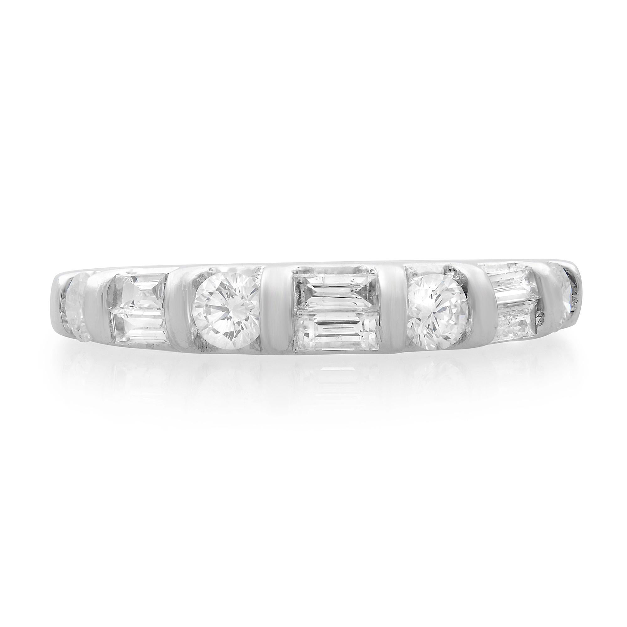This unique diamond wedding band ring is made of solid 14k white gold. Bar prong set round and baguette diamonds. Total carat weight is approximately 0.75. Diamond color J and SI1 clarity. Width: 3.15 mm. Ring size 5.75. Pre-owned condition. Comes