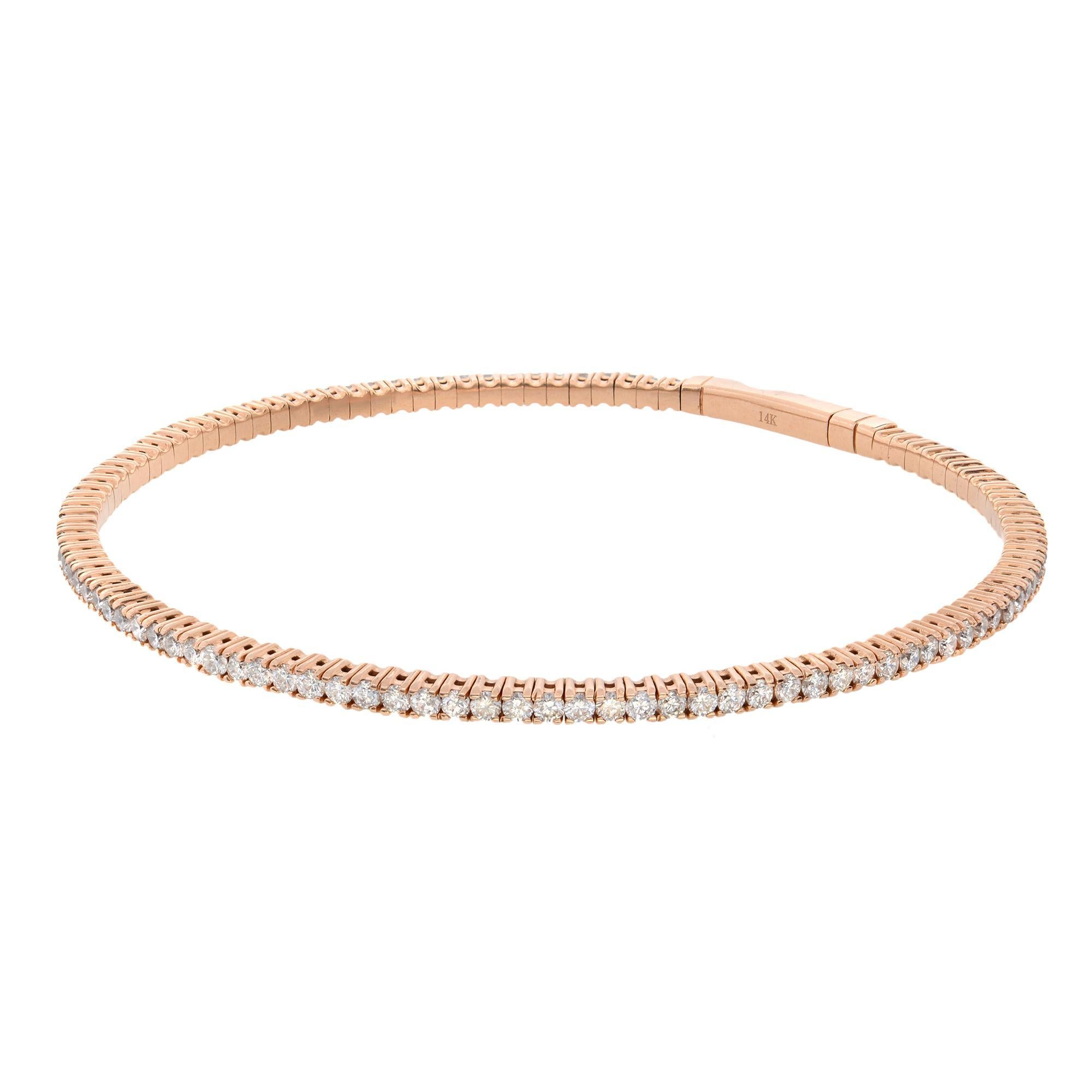 A classic look with easy elegance, this diamond bangle exudes sophistication. One stunning flexible bangle bracelet in 14K rose gold, prong-set with fine white diamonds with a total weight of 1.50cts. The bangle length is  6.75 inches measures and
