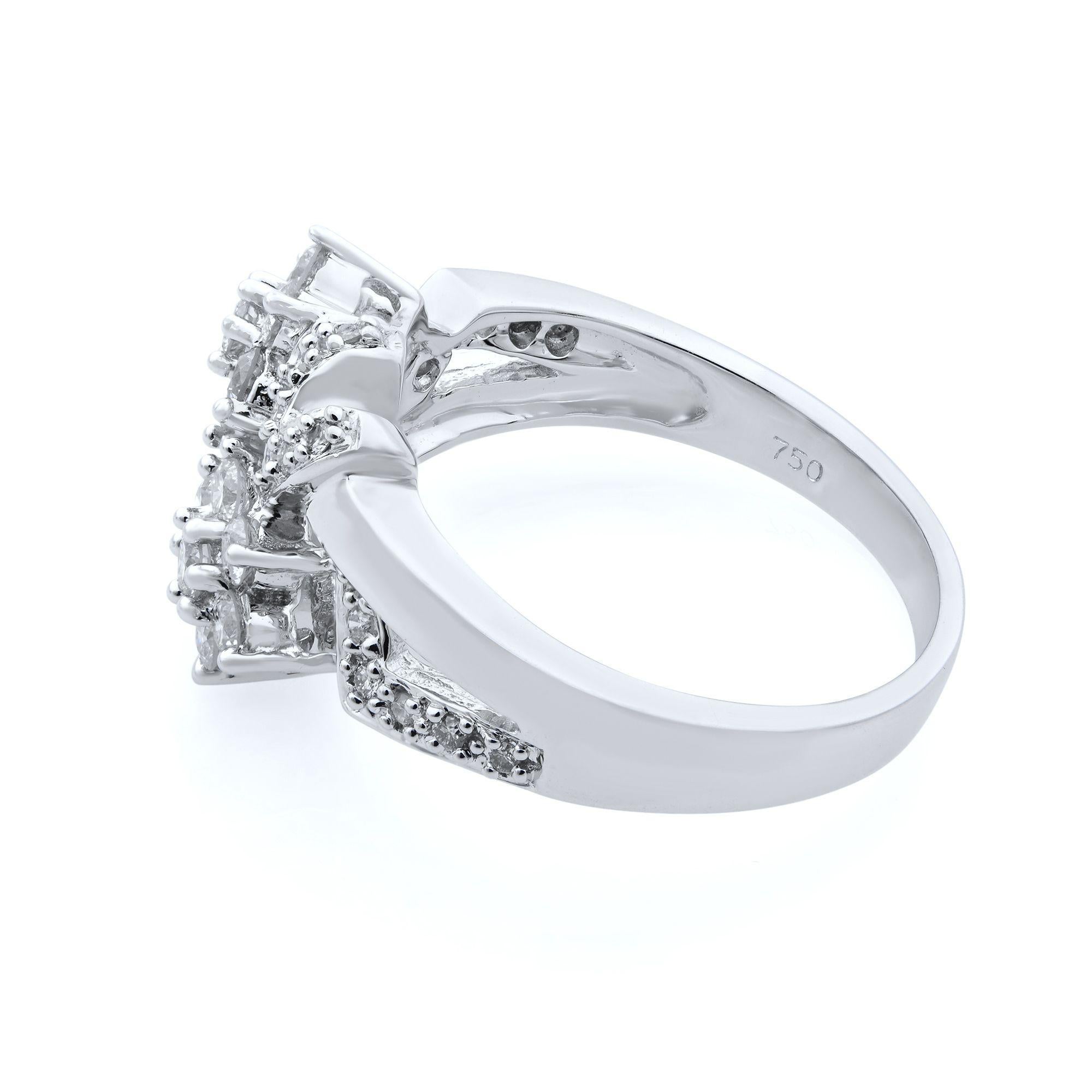 This unique 18K white gold ring features round brilliant cut diamonds set within a floral shape and other shapes on each side. Total diamond carat weight is approx. 0.75. Diamond clarity is VS2 and G-H color. Ring size is 7. Comes with a presentable