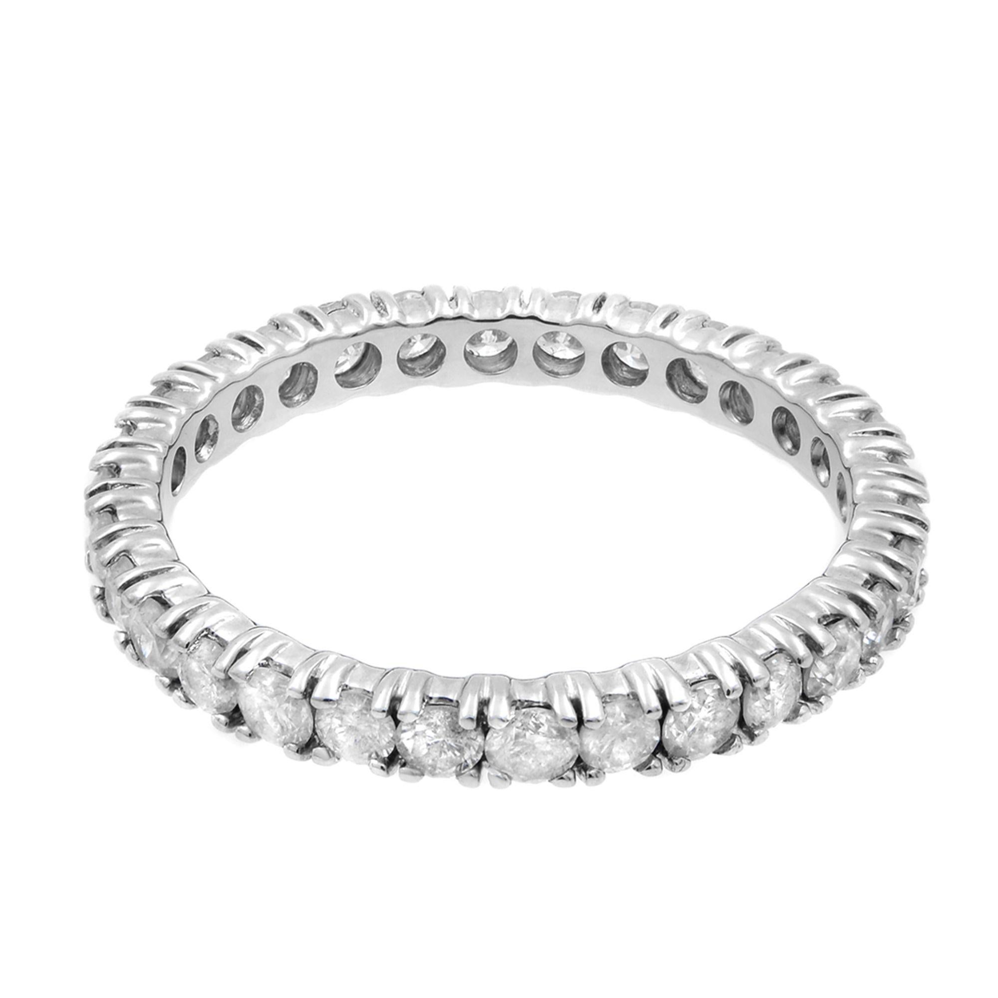This classic eternity band ring features 32 brilliant-cut round diamonds set in sparkling prong setting circling all the way around. Wear it as an anniversary ring, as a wedding band, as a right hand fashion ring, or mix and match with other
