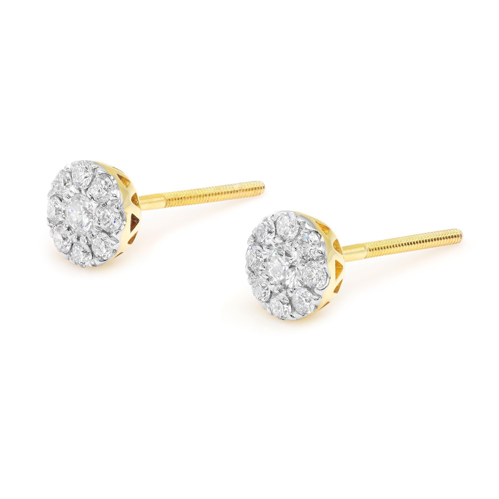 These delicate earrings feature natural dazzling diamond centers surrounded by a stunning halo of pave set diamonds. The setting allows the earring to sit flush with the ear for maximum comfort. Crafted in 14 yellow gold. Total diamond carat weight: