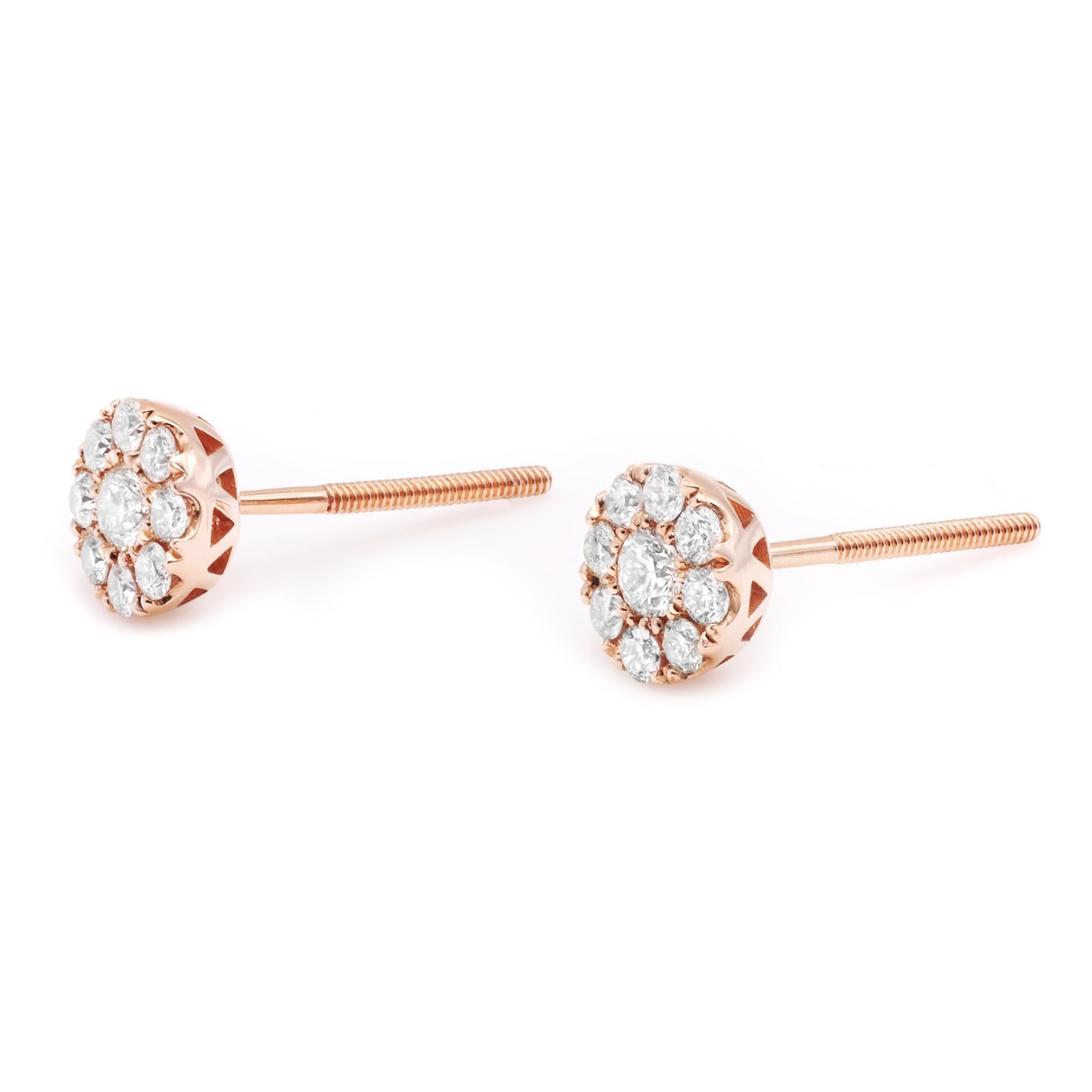 These delicate earrings feature natural dazzling diamond centers surrounded by a stunning halo of pave set diamonds. The setting allows the earring to sit flush with the ear for maximum comfort. Crafted in 14k rose gold. Total diamond carat weight: