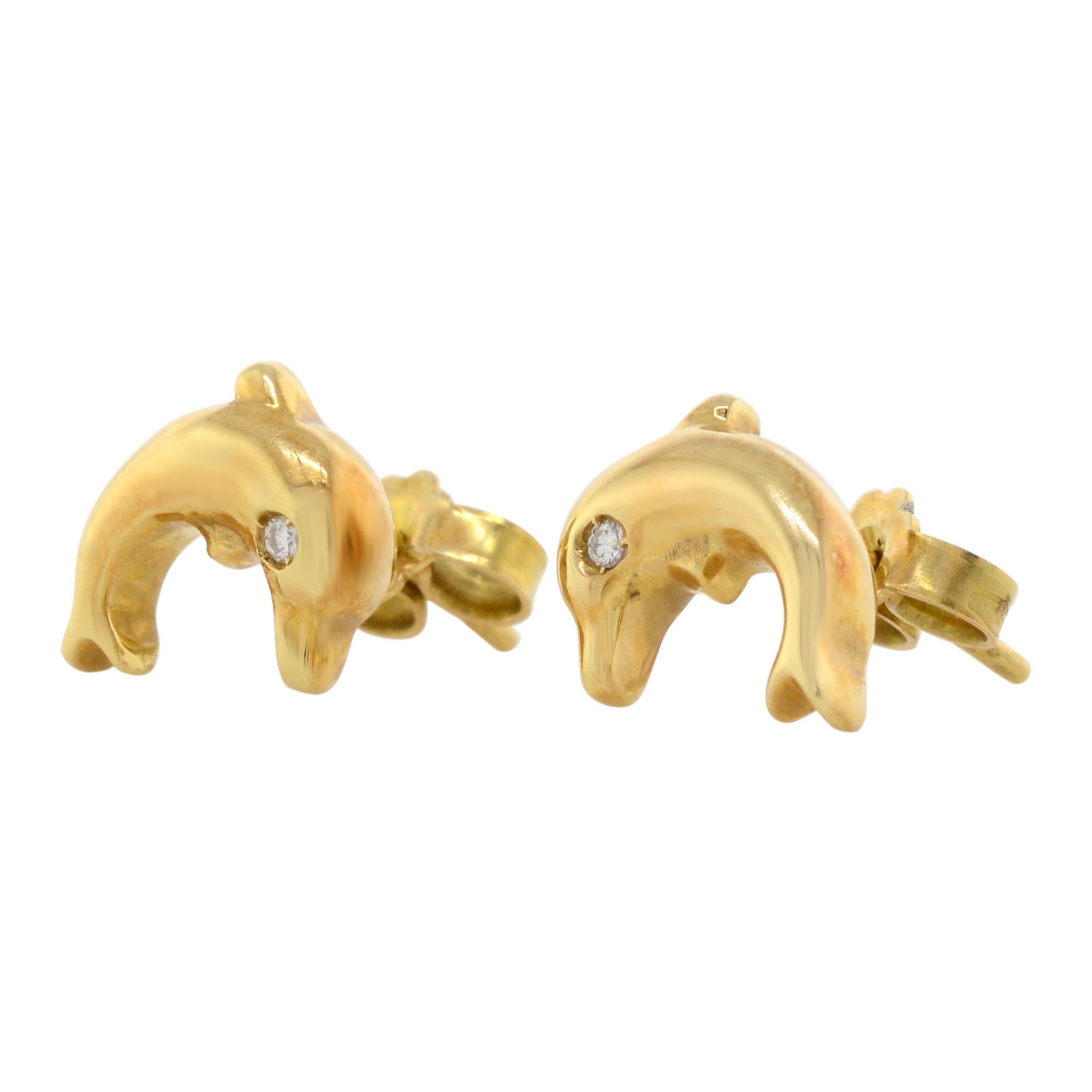 Stunning ladies' diamond dolphin stud earrings crafted in 18K yellow gold are a perfect gift for someone who is into nautical themes and loves water and ocean creatures. These Earrings feature tiny round cut diamonds as dolphin eyes. Total diamond