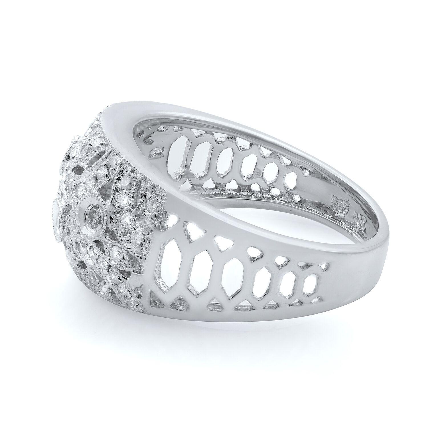 Representing a beautiful wide fashion band with excellent round cut white diamond stones set in a dome shape band. This diamond ring is crafted in 14k white gold. The ring is set with natural round cut diamonds weighing 0.75ct. The diamonds have a