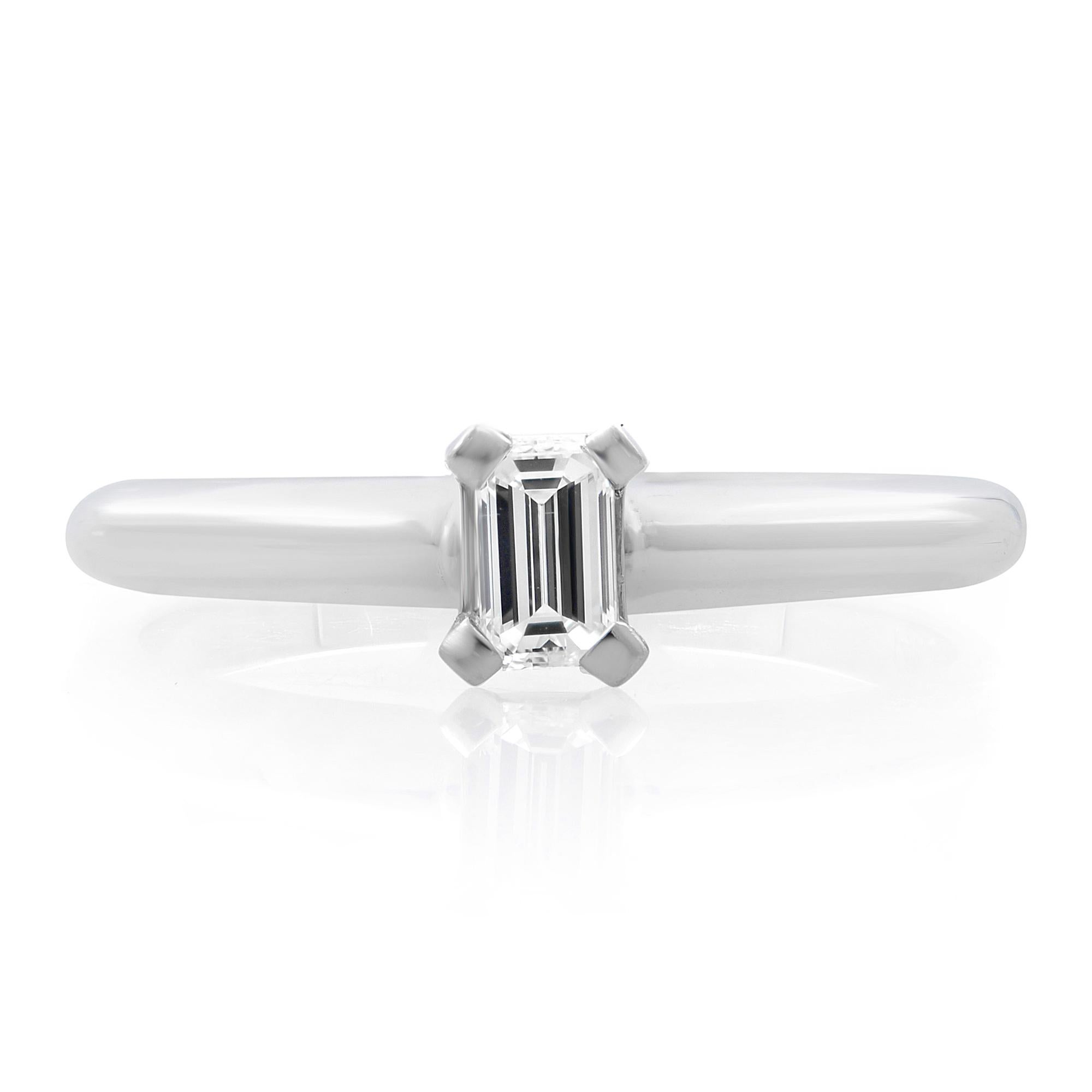 A delicate solitaire emerald cut diamond ring. Crafted in 14k white gold. The center stone weights, 0.20cttw. Diamond color G and VS-SI clarity. Ring size 6. Comes with a presentable gift box. 
