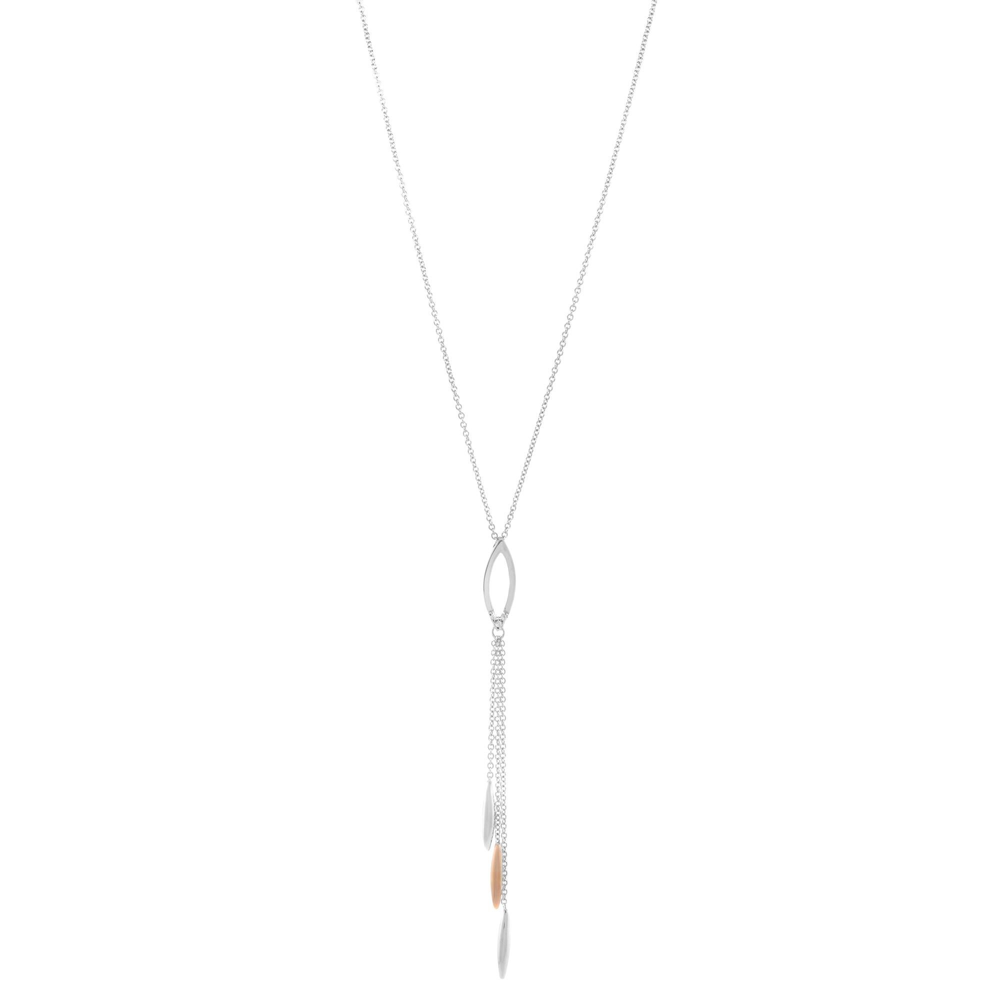 So dainty and pretty that we know it will look wonderful when traveling, going to the beach and having it on tan skin. Beautiful chain pendant necklace crafted in 18k white and yellow gold. Chain length: 16 inches. Motif length: 2.5 inches. Weight: