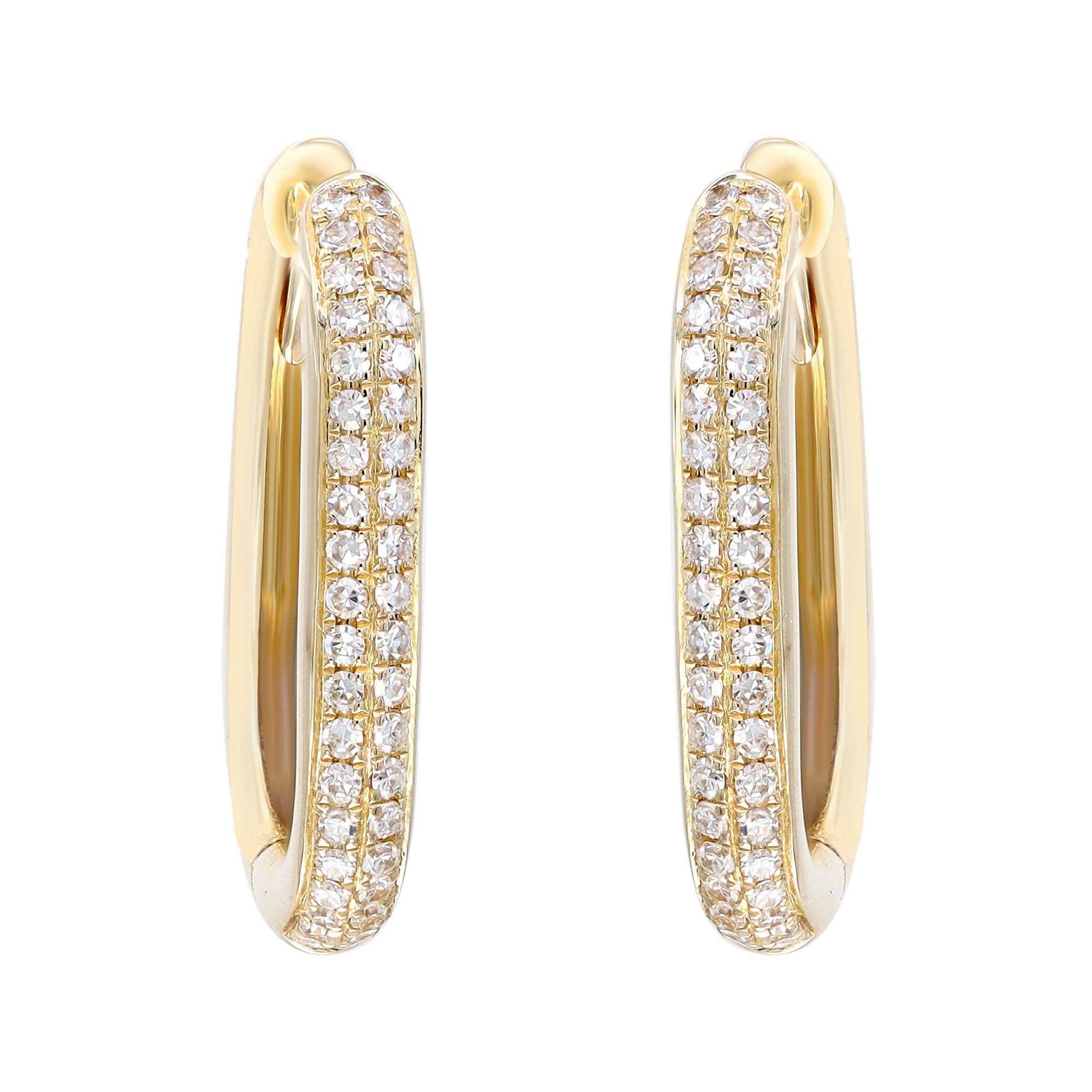 Sleek and classic, a timeless pair of diamond huggie hoop earrings, perfect for a great everyday look. These hoop earrings are crafted in 14K yellow gold and encrusted with two rows of pave set round cut diamonds weighing 0.18 carat. Diamond color