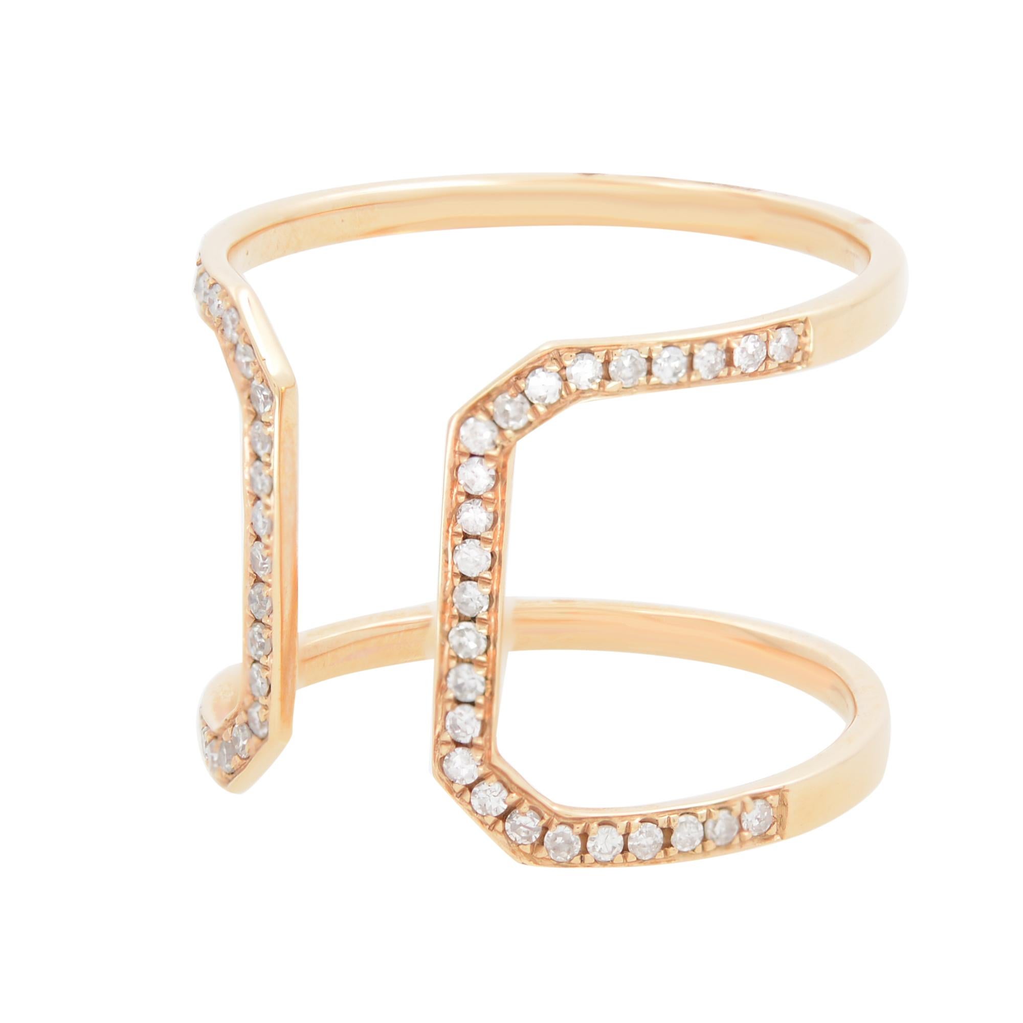 This 18K rose gold diamond guard designed ring is set with 0.25cttw tiny round brilliant cut diamonds. Diamond color H-I and SI clarity. This unique ring is very chic and stylish. Looks great alone or with other rings. Ring size 7.5. Width of the
