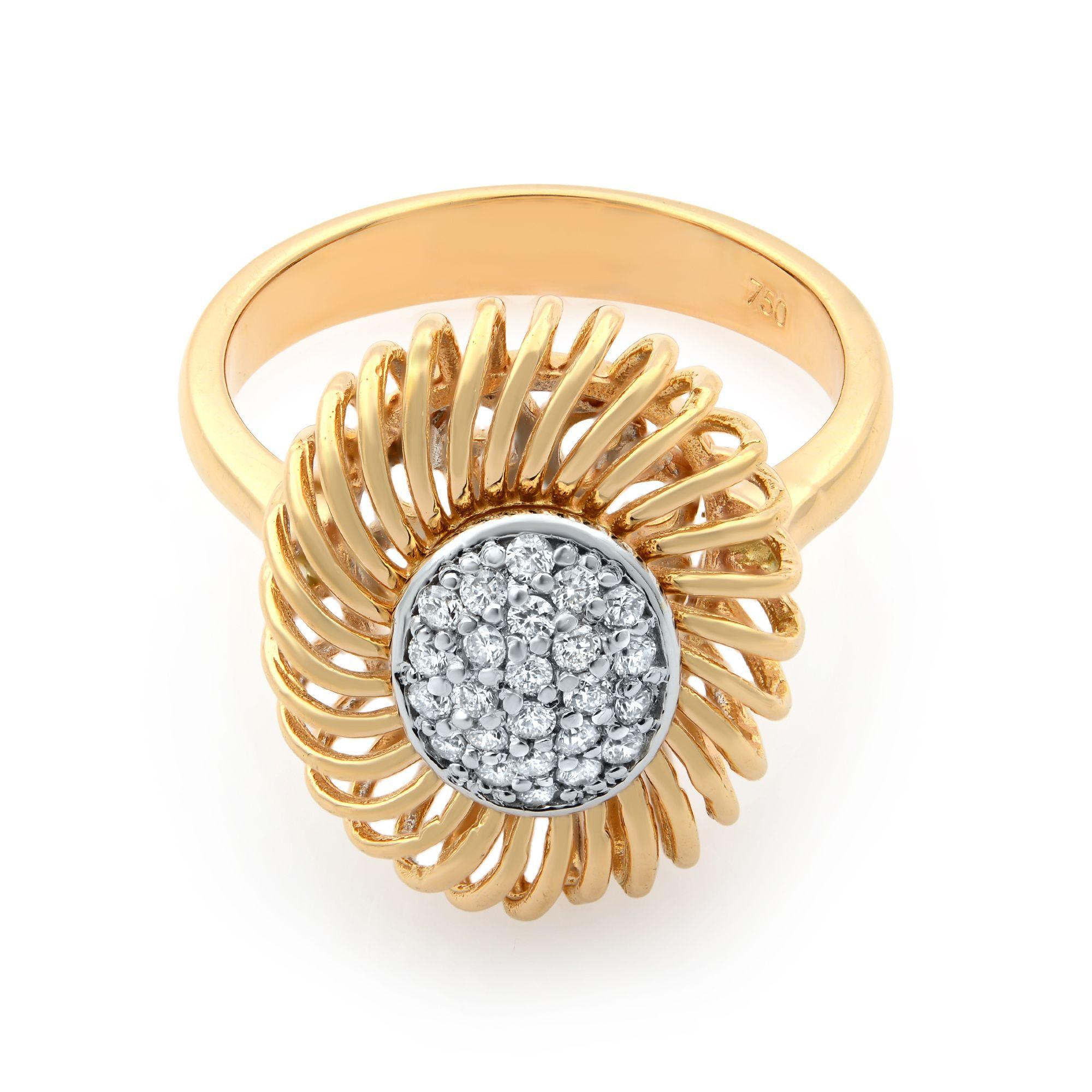 A unique cocktail ring crafted in 18k rose gold and set with 0.15cts of round cut diamonds. The halo is made in a spiral shape. Ring size 6.75. Comes in our jewelry presentation box. 