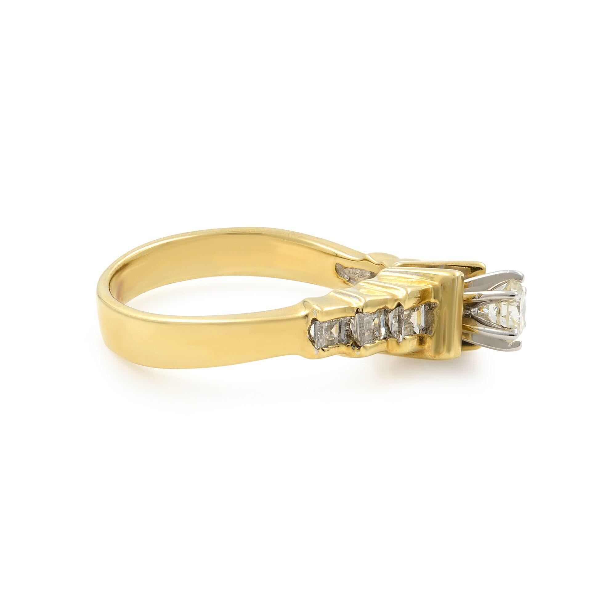 This beautiful ring is crafted in 14K yellow gold. Center stone: round cut white diamond weighing approx. 0.23 cttw.; accents stones: 6 princess cut white diamonds weighing approx. 0.39 cttw. Total diamond weight is 0.62 cts. Size of the ring is