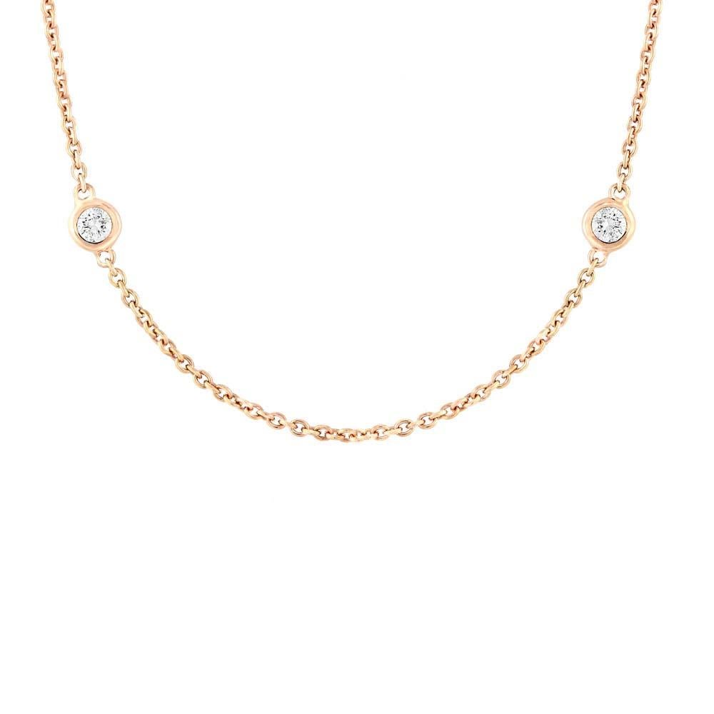 Beautiful and delicate this precious diamond necklace will leave everyone speechless the moment they see it. Crafted in high polished solid 14k yellow gold this necklace is set with brilliant round cut diamonds of G-H color and clean VS clarity.