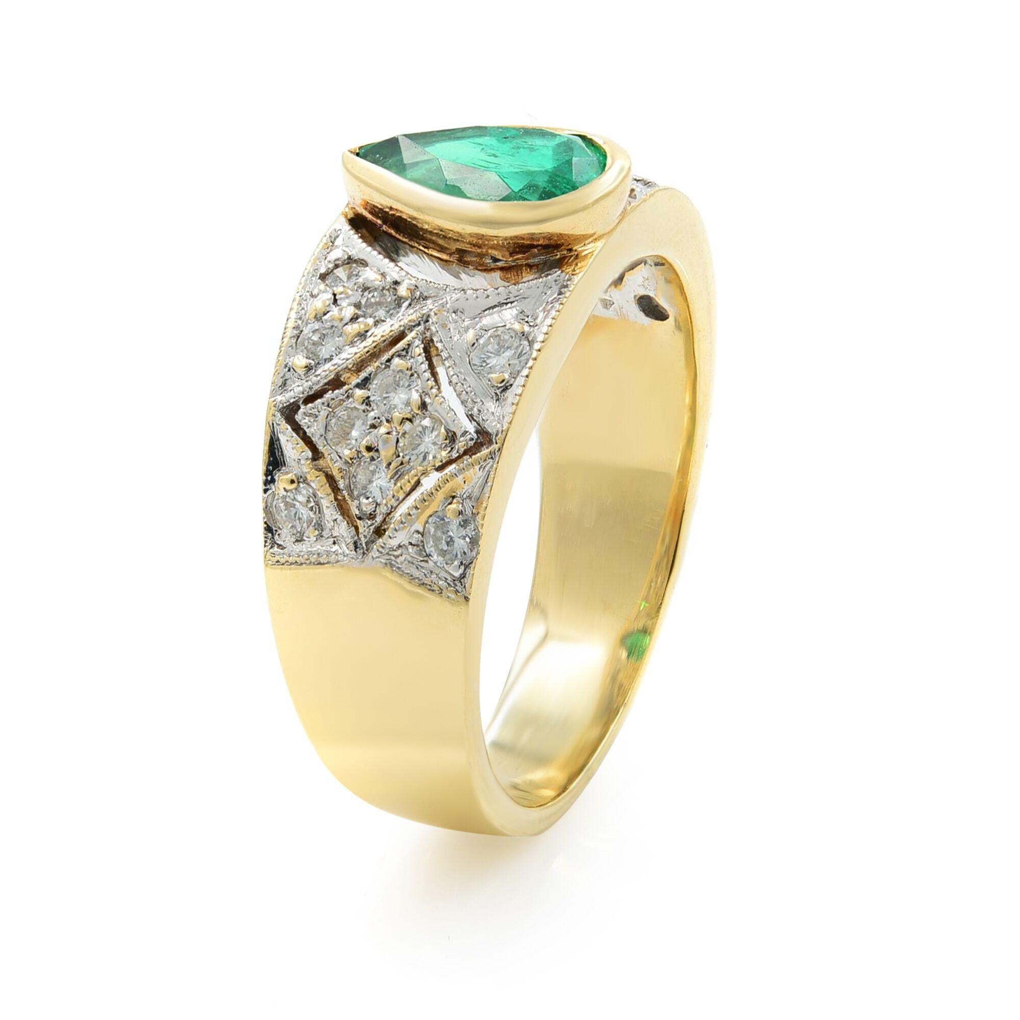 Absolutely gorgeous ladies green emerald and diamond band ring. The ring features one spectacular pear cut green emerald weighing 1.30 cttw as a center stone with bezel setting. Bright color stone ring with diamonds crafted in 14k yellow gold ring.