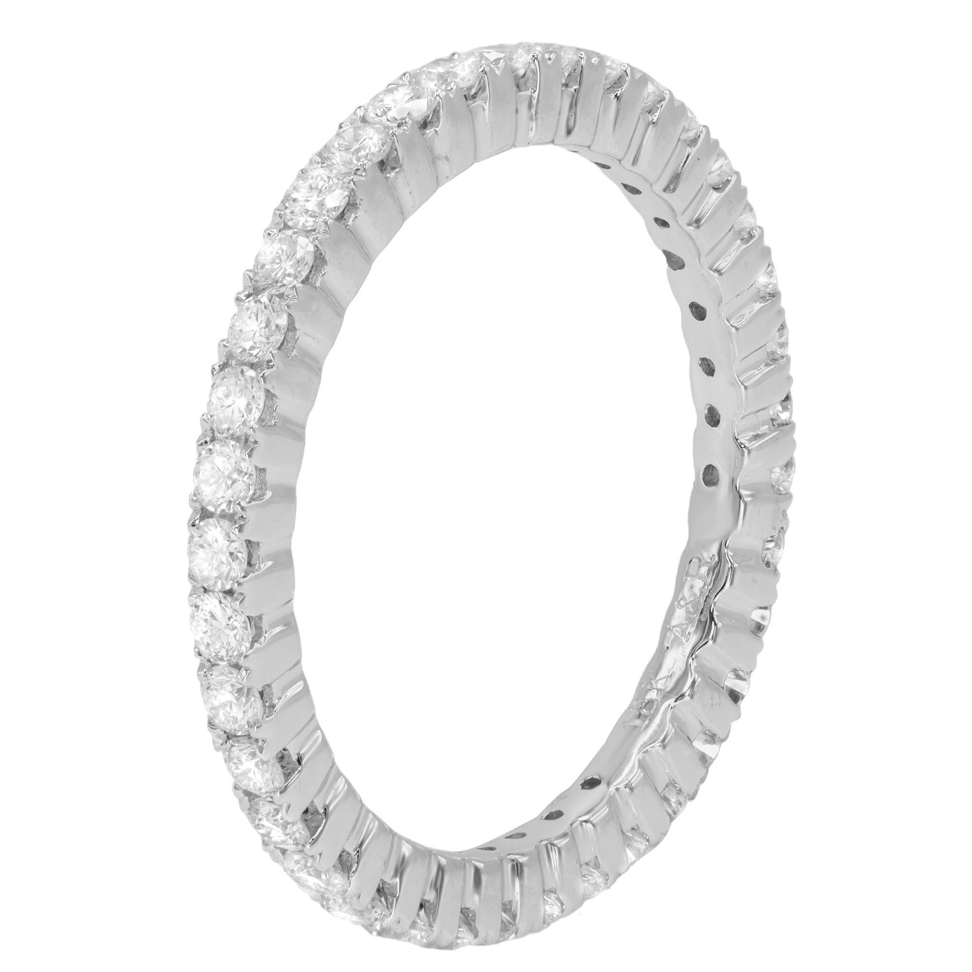Brilliant in every way, this diamond eternity wedding band ring features round cut, natural diamonds in a pave setting. Set with a total of 0.93ct of round cut diamonds. Diamond color G-H and VS-SI clarity. Width: 1.80mm. Ring size 7. Comes with a