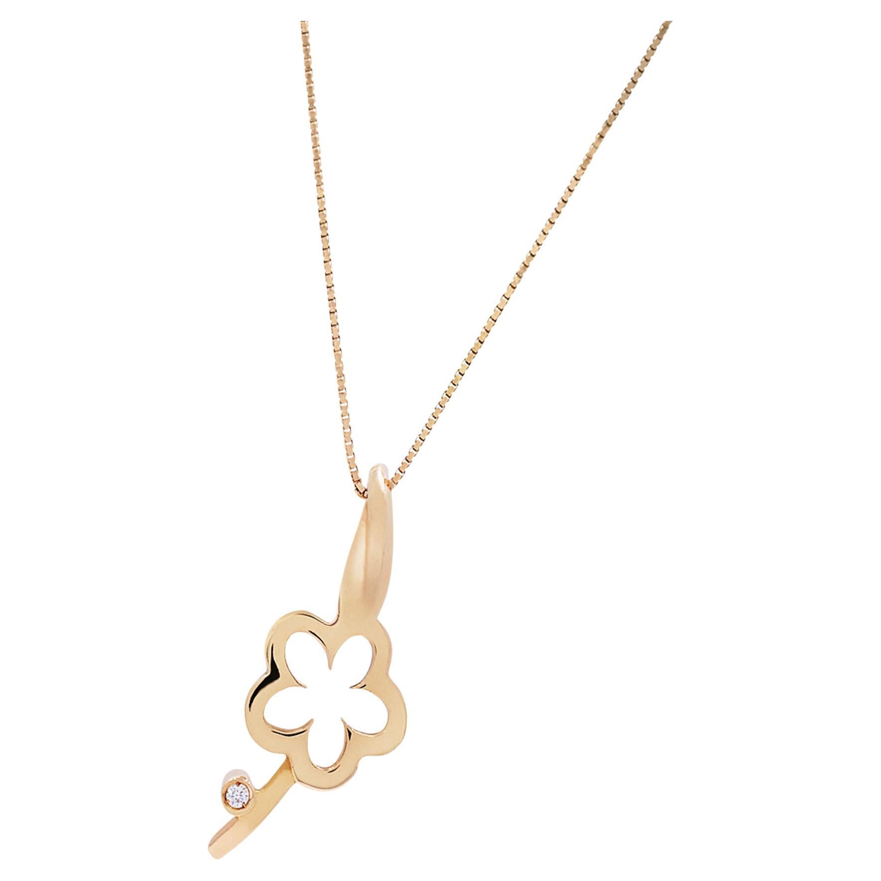 Fall in love with this beautiful flower pendant with a single dazzling round cut diamond. This pendant is a perfect gift for any occasion. It features a flower charm measuring 15mm long with stunning details and encrusted with one round cut diamond