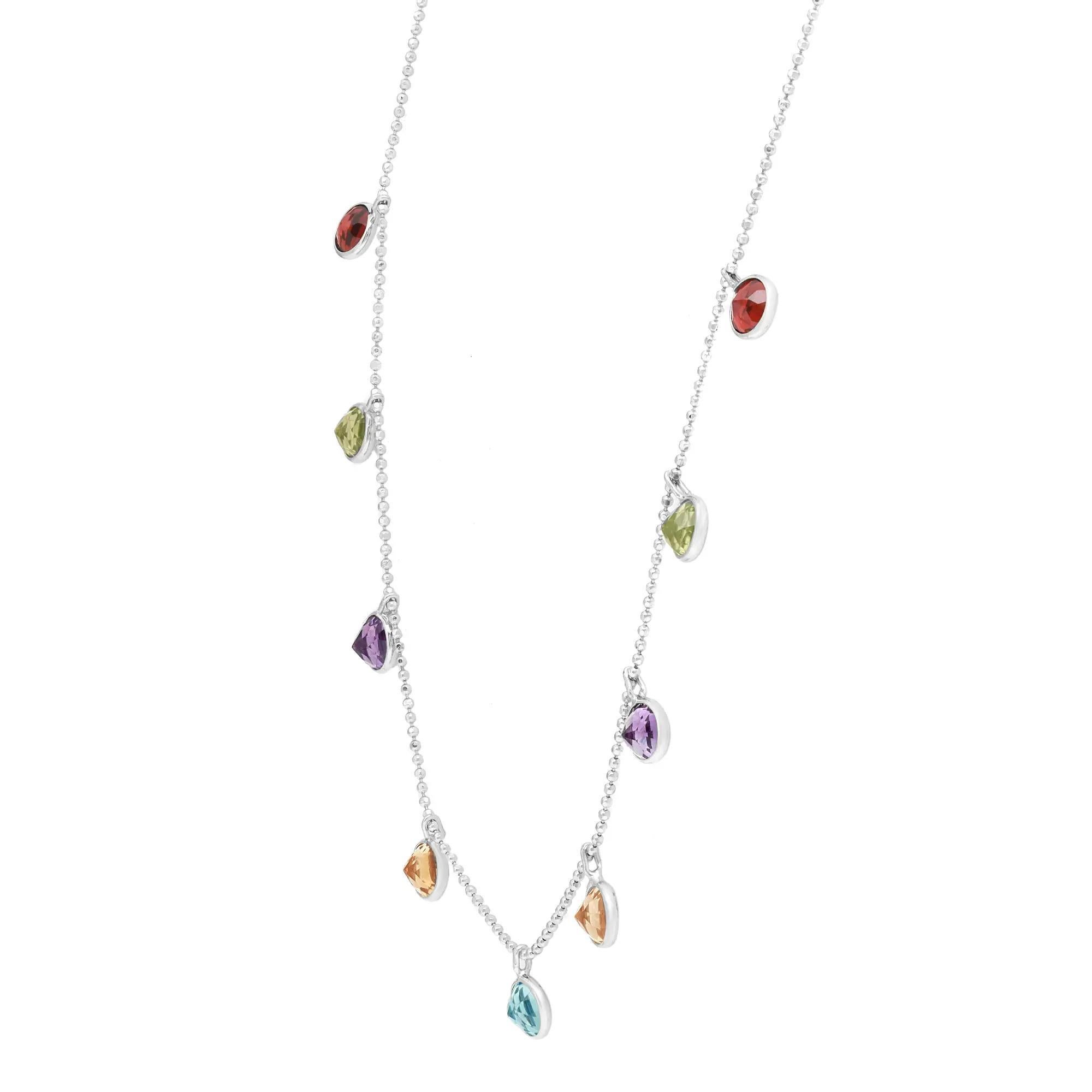 Delicate and oh so trendy, gemstone chain necklace. Crafted in 14K white gold, this necklace features 9 bezel set multicolor natural gemstones. Chain length: 18 inches. Total weight: 2.04 grams. It's stackable and easy everyday wear. Comes with a