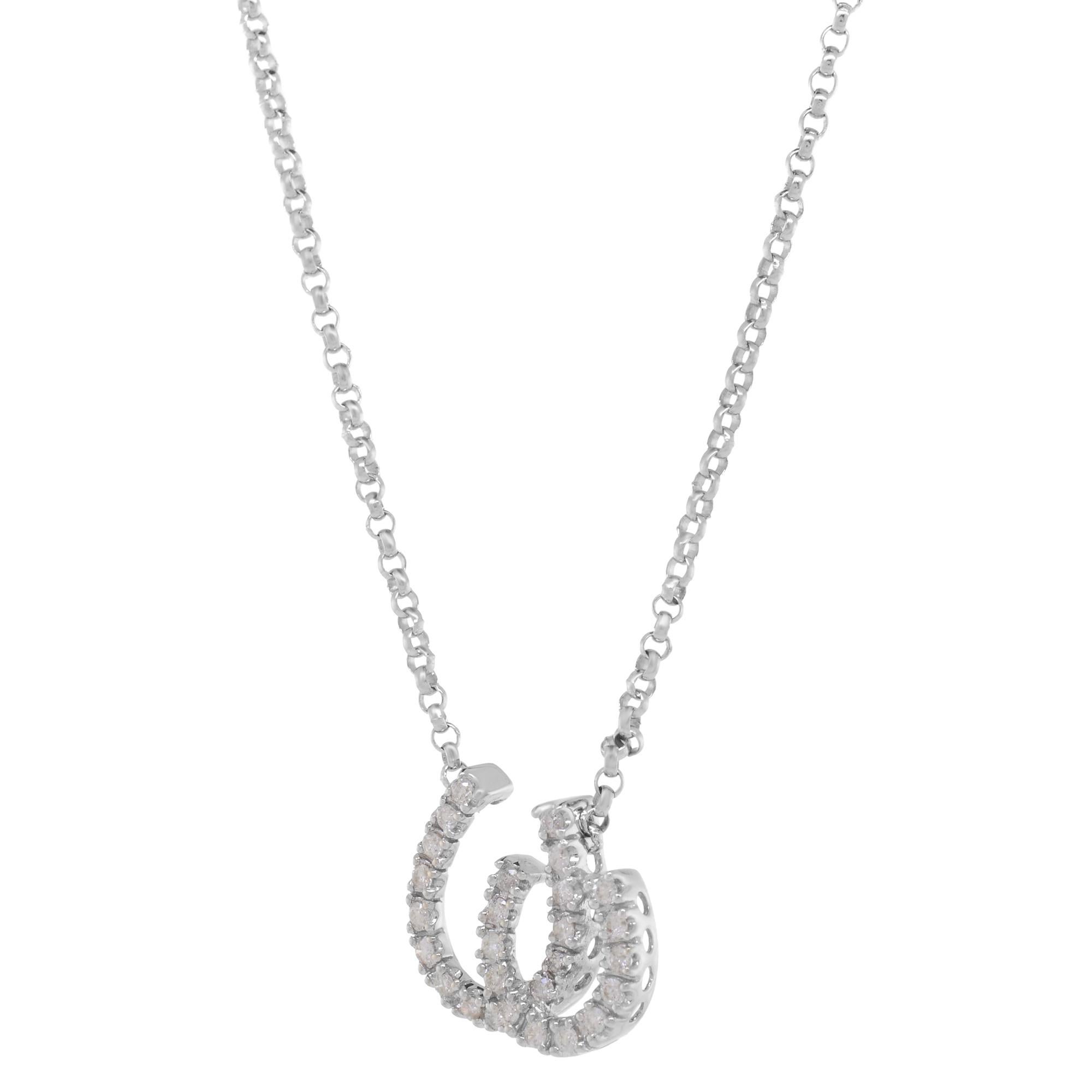 This beautiful double horseshoe diamond chain pendant necklace brings luck and happiness to anyone who wears it. Crafted in 14K white gold, it features a 12 mm long pendant with prong set round cut diamonds placed on a 16 inches cable link chain for
