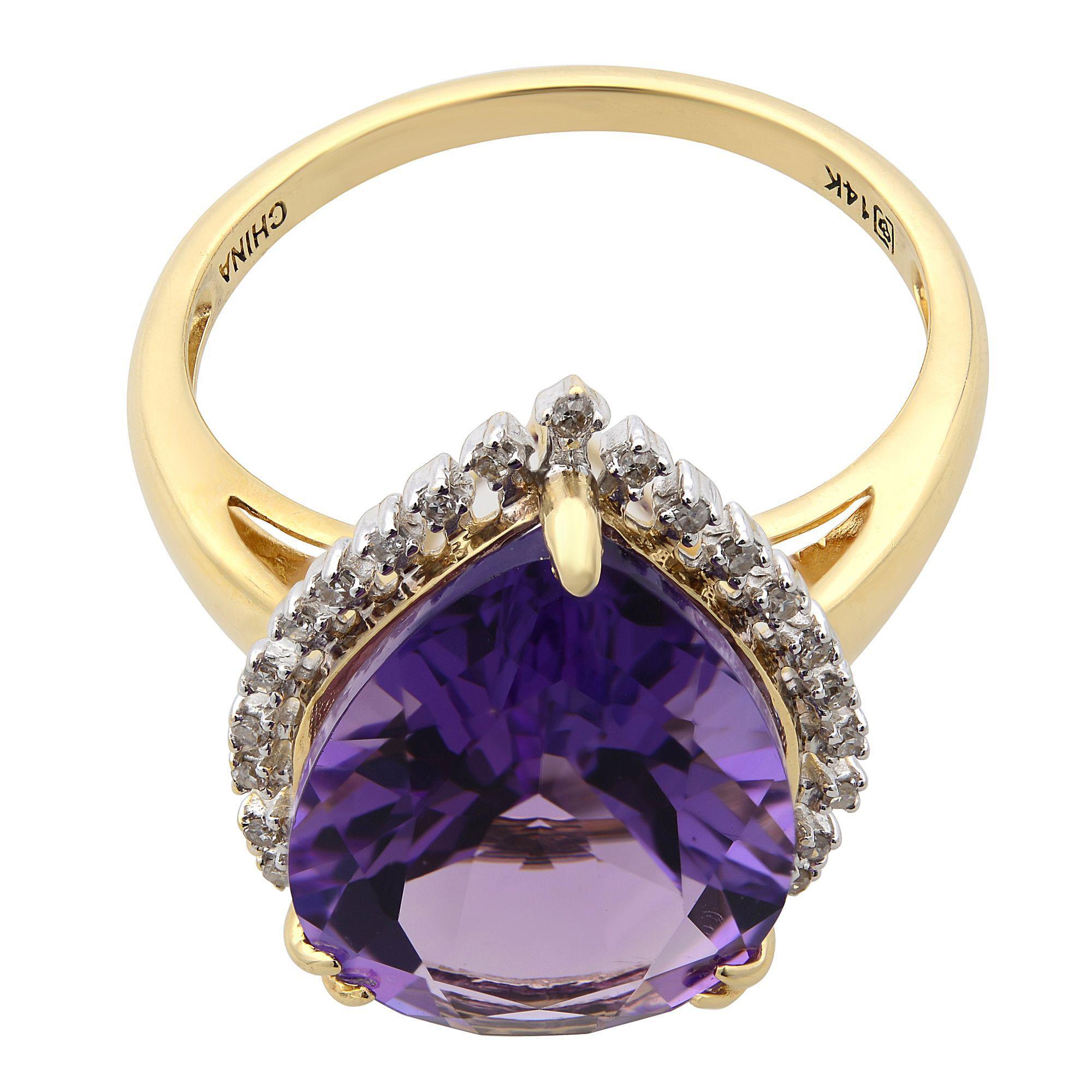 This amazing large Amethyst cocktail ring is crafted in 14k yellow gold. The prong set, intense purple amethyst is surrounded by a halo of glistening tiny diamonds. Amethyst size: 11.00 carat. Diamond total weight: 0.25 carat. Ring size US 11. Comes