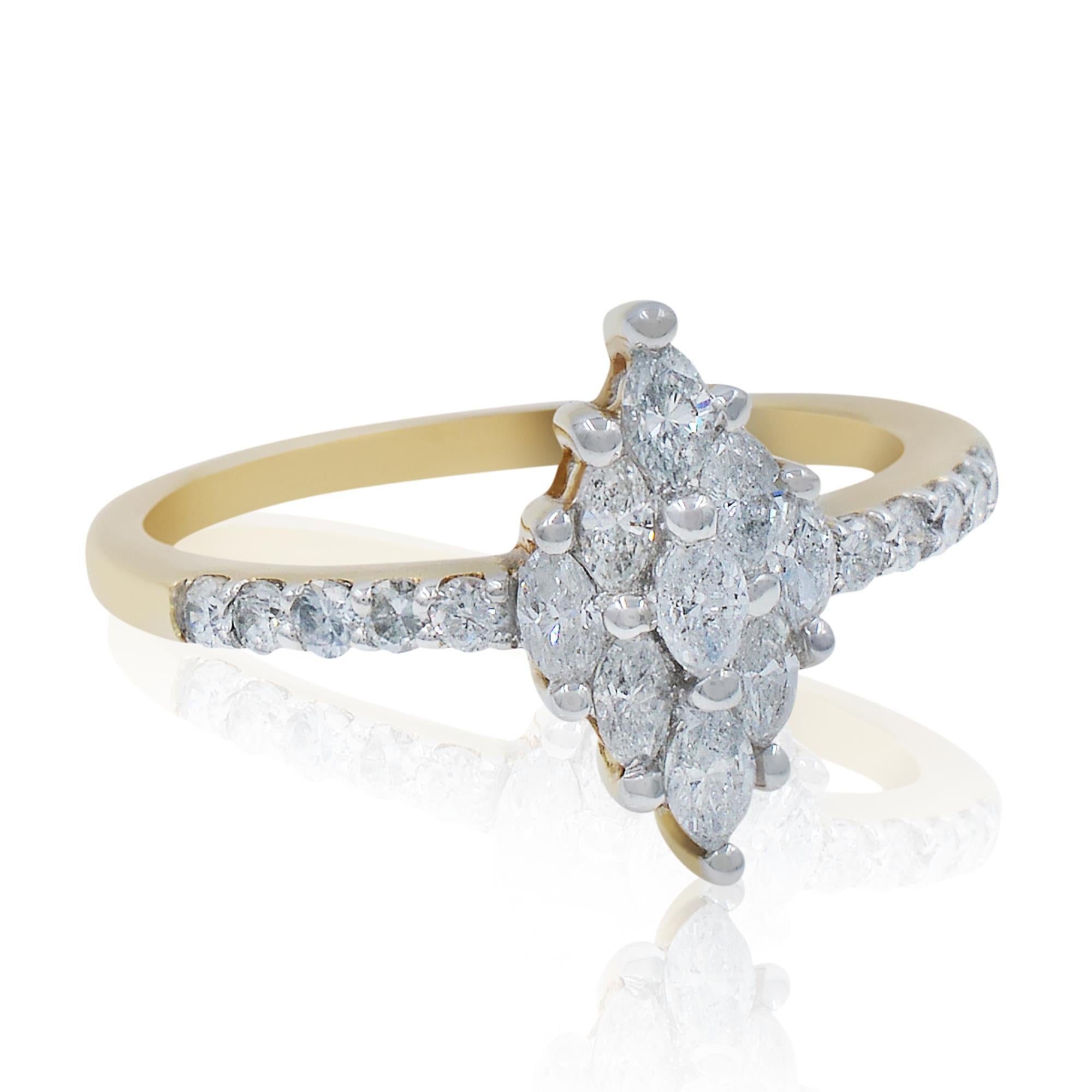 This absolutely outstanding cocktail ring is crafted in 14k yellow gold. Nice marquise cut diamonds are set in rhombus shape shank and accented with five round diamonds on each side set in micro pave. Total diamond weight is 1.13cts. Ring size: 7,