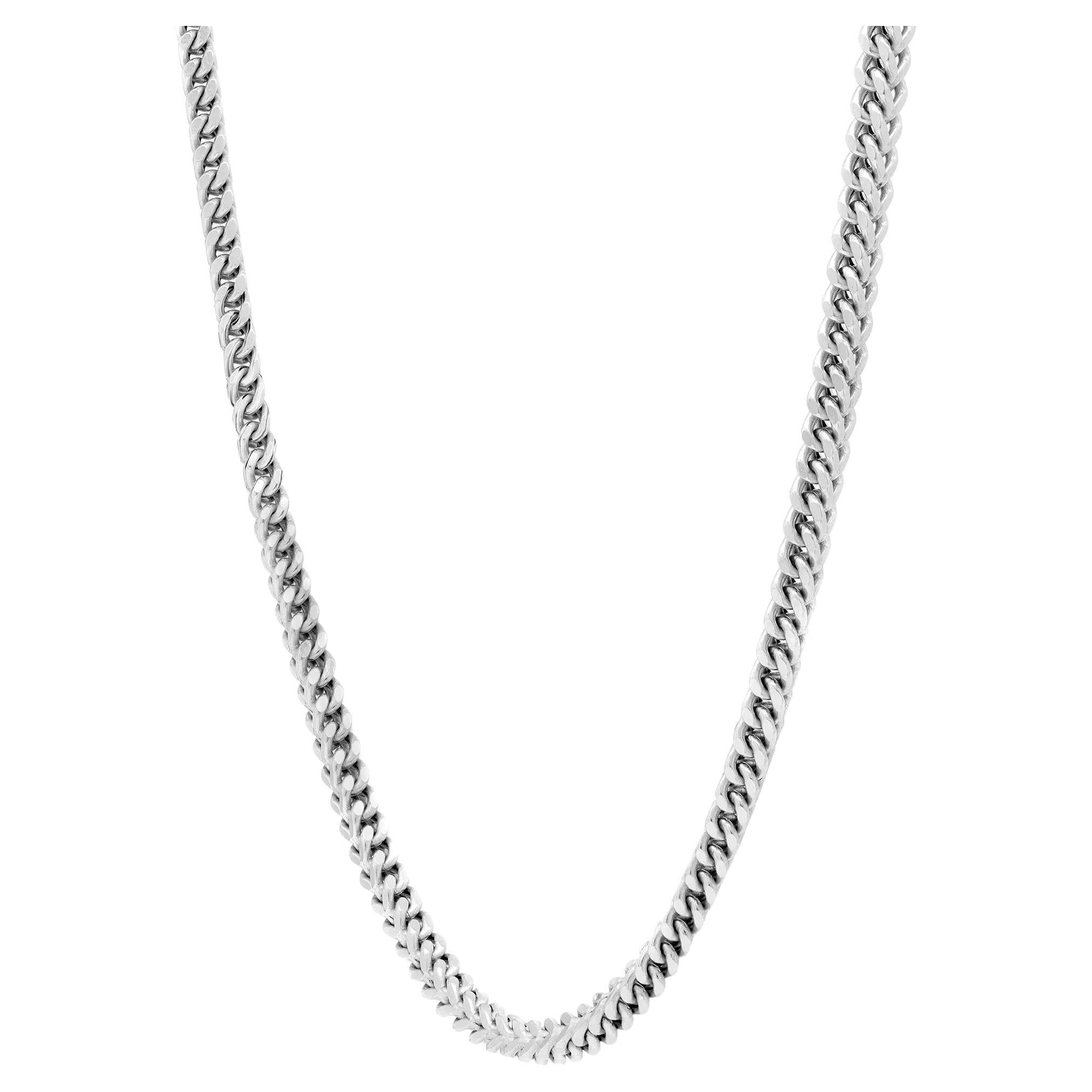 Questa classica catena a maglie cubane di Miami è realizzata a mano in oro bianco 14 carati altamente brillante. La catena misura 28 pollici di lunghezza e 4 mm di larghezza. Peso totale: 36 grammi. Questa catena si chiude in modo sicuro con una