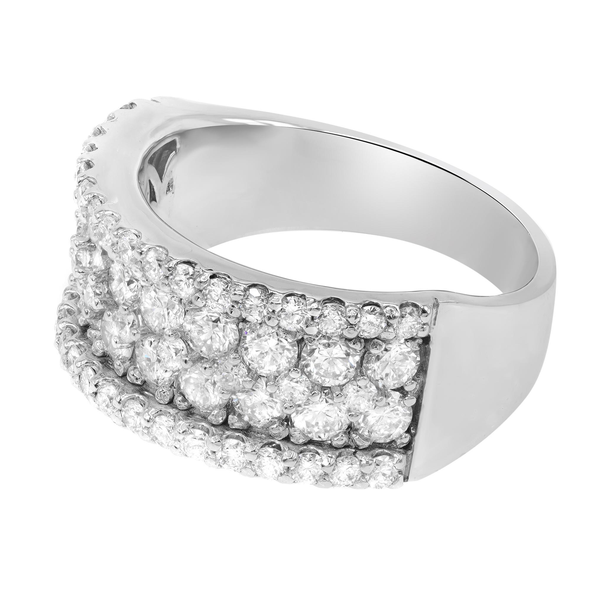 Dazzling rows of round diamonds adorn this stylish concave broad ring, crafted in 14k white gold. Set with 2.15cttw of round cut diamonds. Diamond color G and VS clarity. Width of the ring 9.30mm. Ring size 6.75. Comes with a presentable gift box