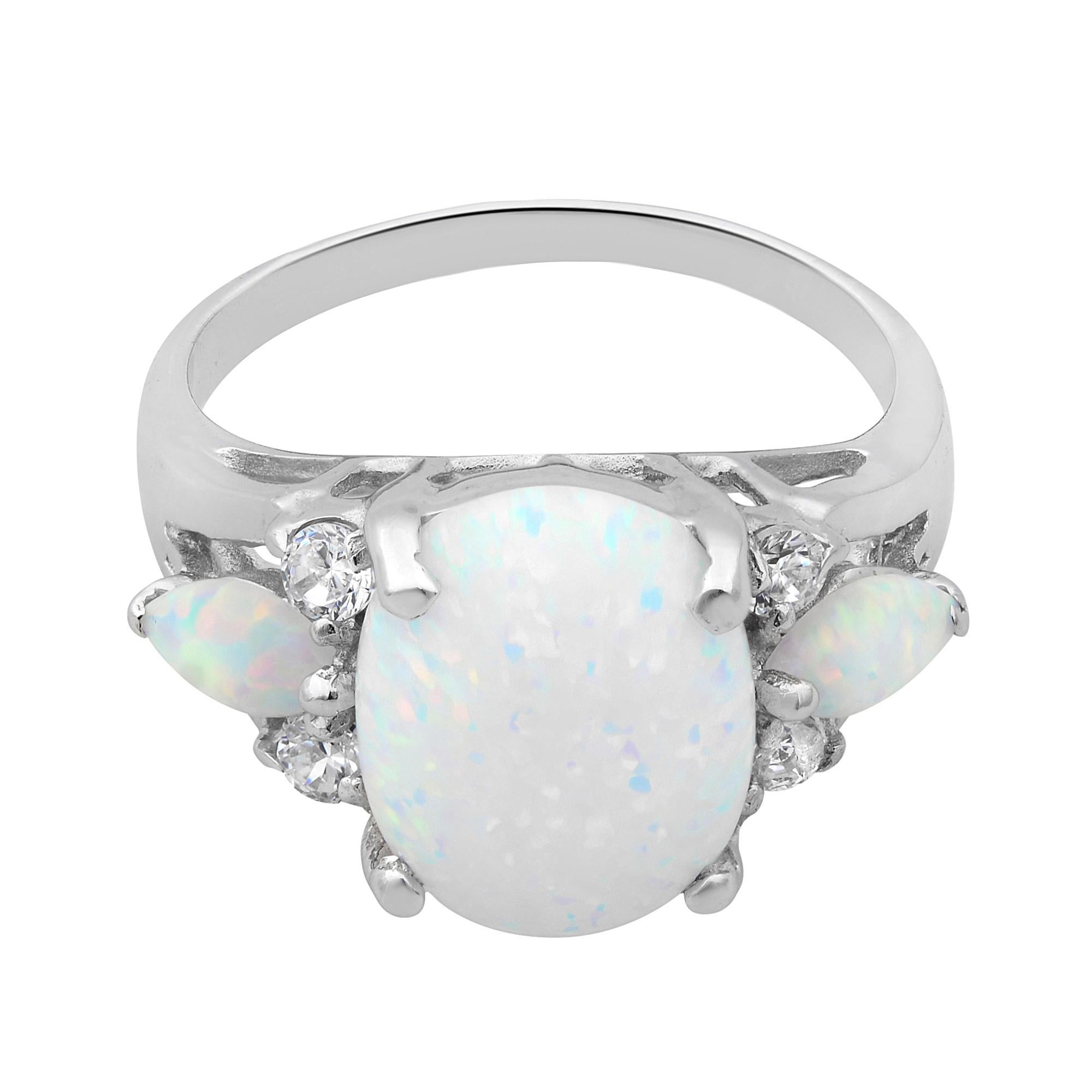 Shine your way with this white oval shaped cabochon Opal ladies ring crafted in 14k white gold. Great gift for someone born in October. Ring size 7.25. Total weight: 4.75 grams. Great pre-owned condition. Comes with a presentable gift box.
