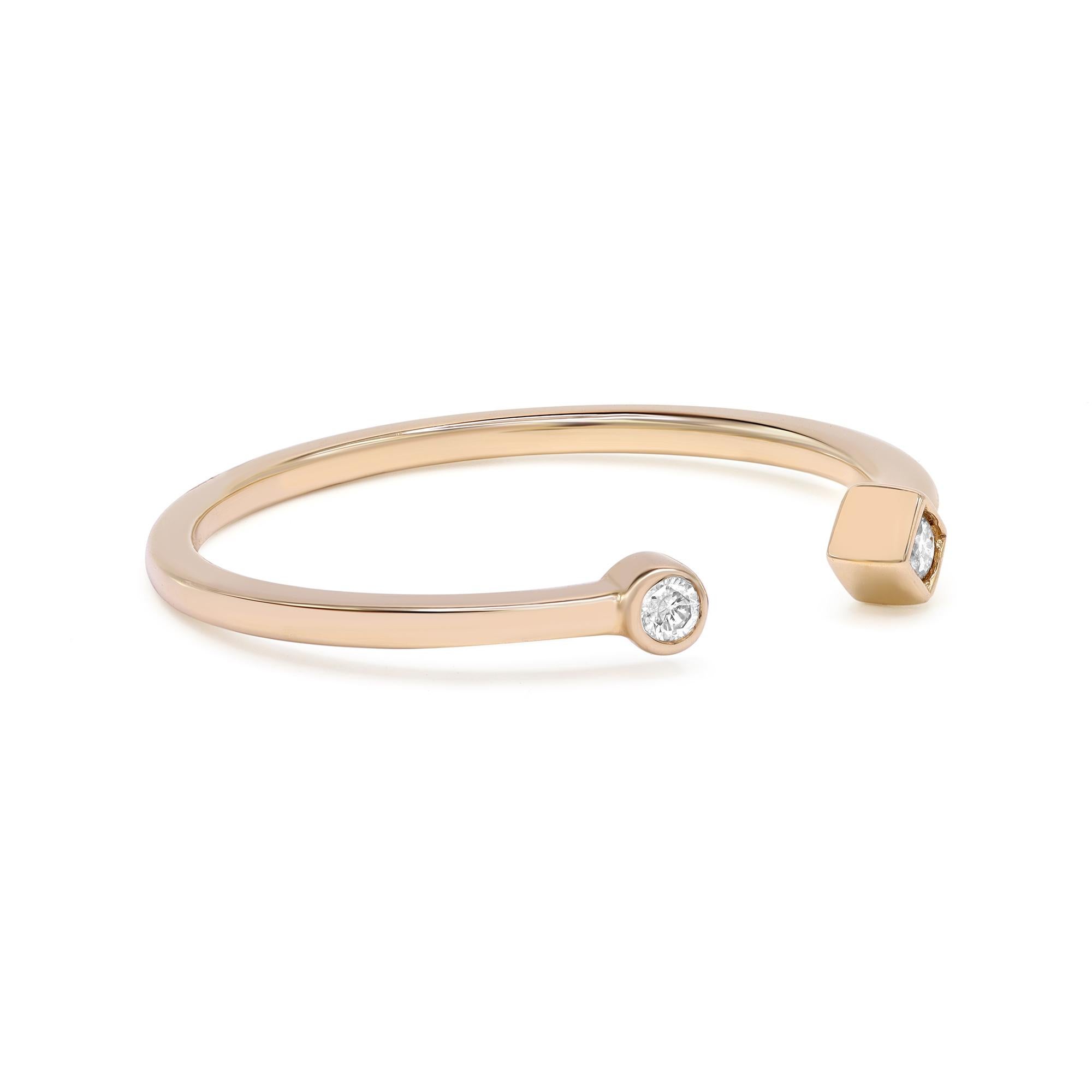 Delicate yet chic, this open shank diamond ring is a perfect fit for any occasion. Crafted in 14K yellow gold with bezel set round cut diamonds weighing 0.04cttw, it's stackable and easy to mix and match. Ring size 6. Weight: 1.02 grams. Comes with