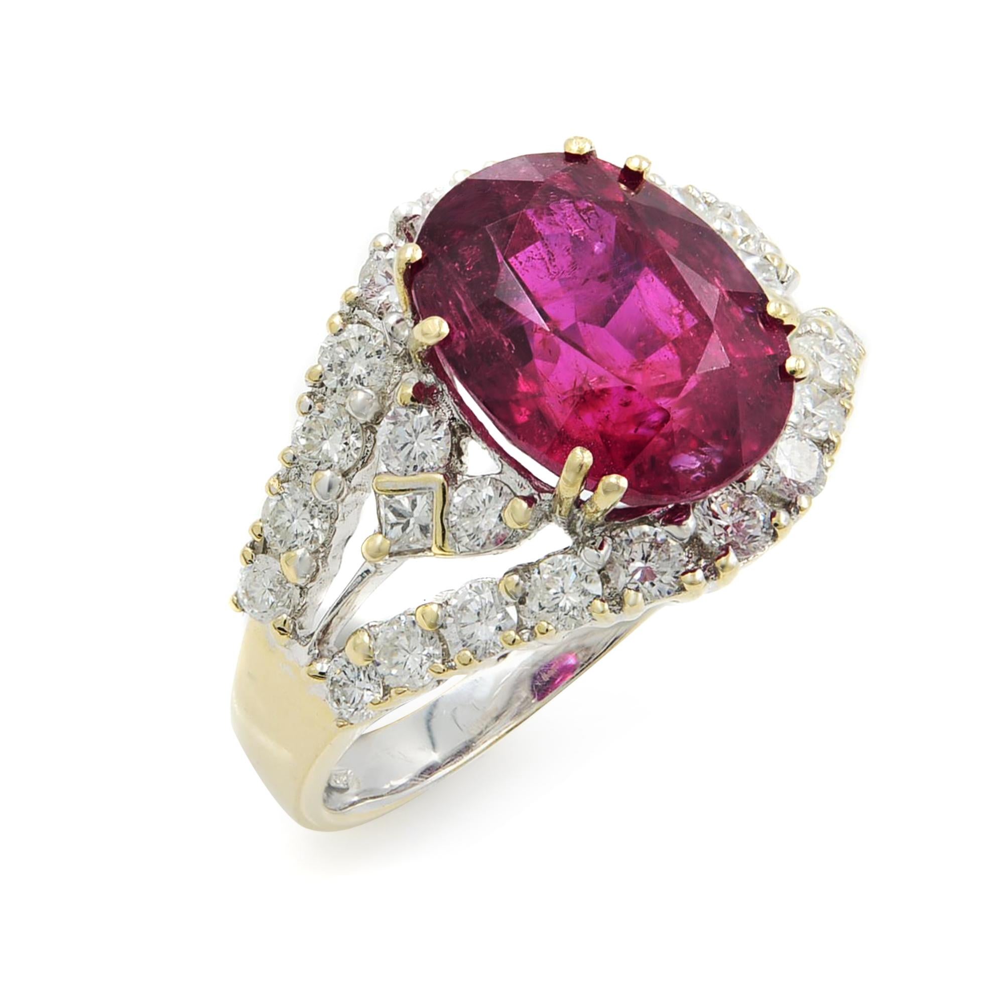 The stunning ring from our Rachel Koen Collection is retro inspired. This 18k two tone yellow and white gold ring will have you walking the red carpet. Lush in color and styling, this precious oval shaped ruby center stone weighs 5.55 carats. In