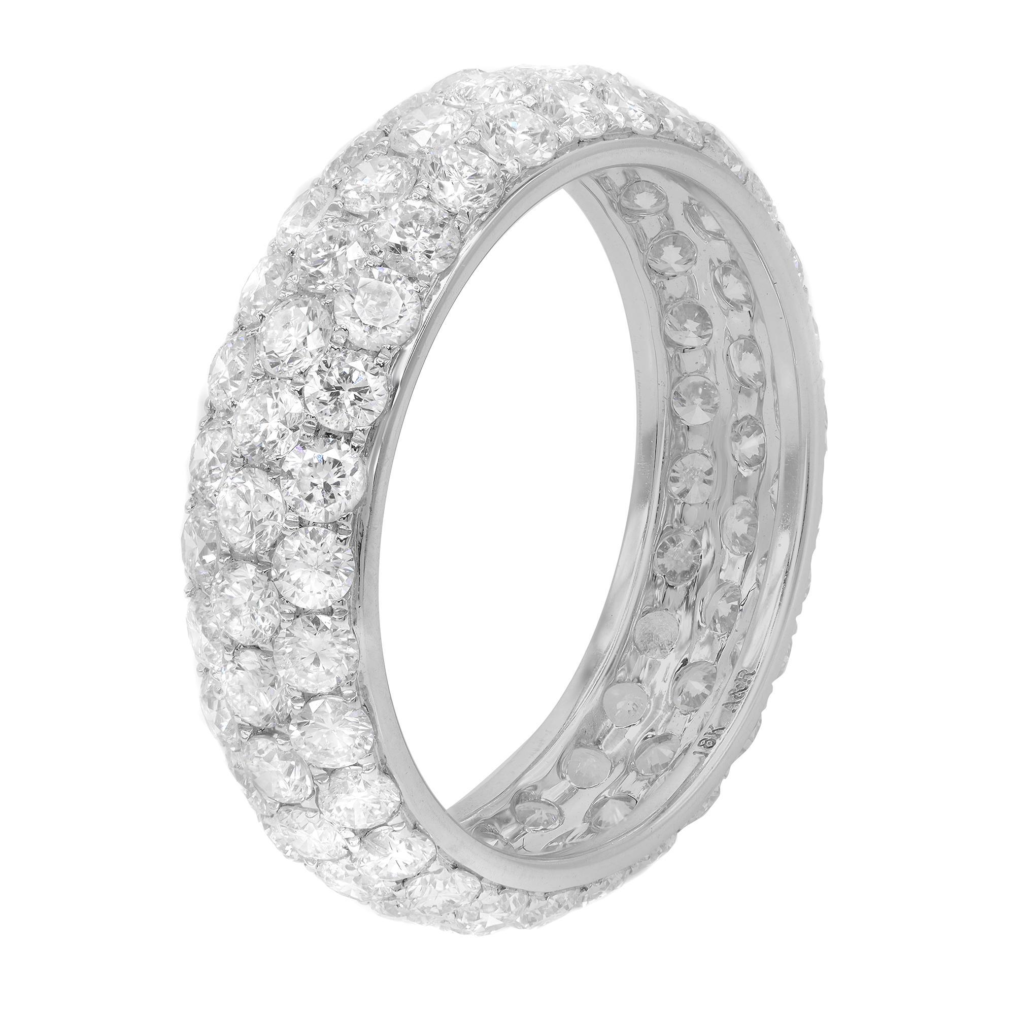 This stunning diamond eternity wedding band ring glitters from every conceivable angle. Set with three rows of dazzling round cut diamonds,  totaling 3.22cts. Diamond color F and VS clarity. Wear it as a wedding band or as a fashion ring. Ring size