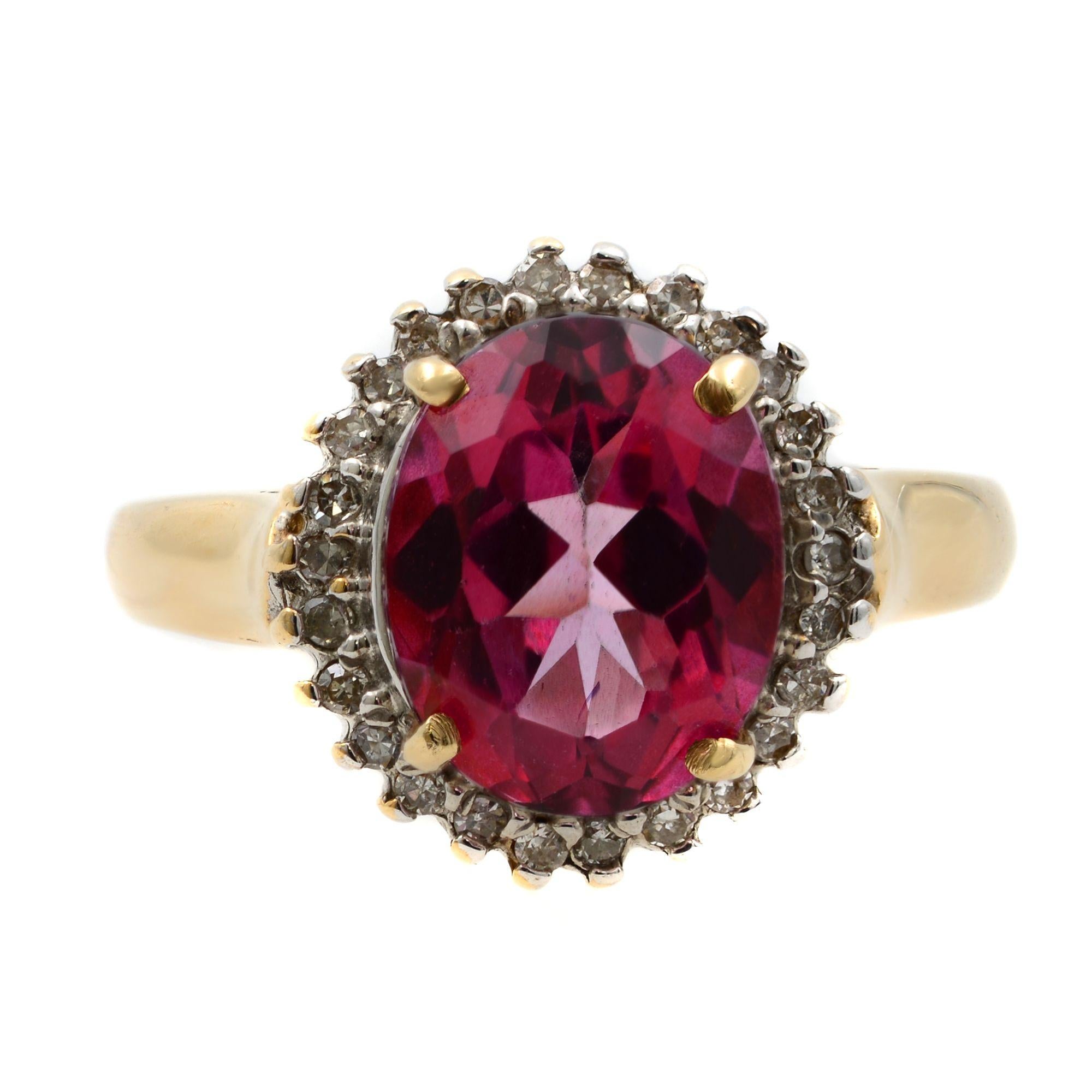 The design of this beautiful pink tourmaline ring is unique statement and her beautiful engagement ring. A radiating 3.00 carat oval pink tourmaline sits majestically at the core while the dazzling diamonds accentuate its beauty. The diamonds are in