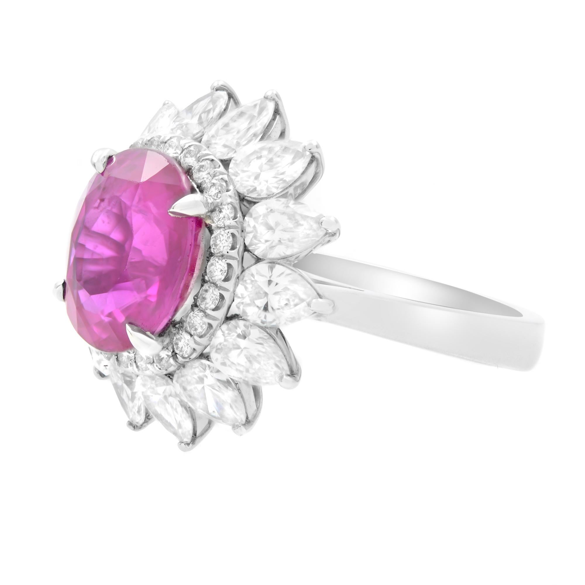 A luxurious platinum purplish pink oval sapphire diamond halo ring. Diamond halo over oval pink sapphire and more pear shaped diamond around the halo. Pink Sapphire weights, 4.47carat and diamonds are 2.40 carat. Diamond color F-G and VS clarity.