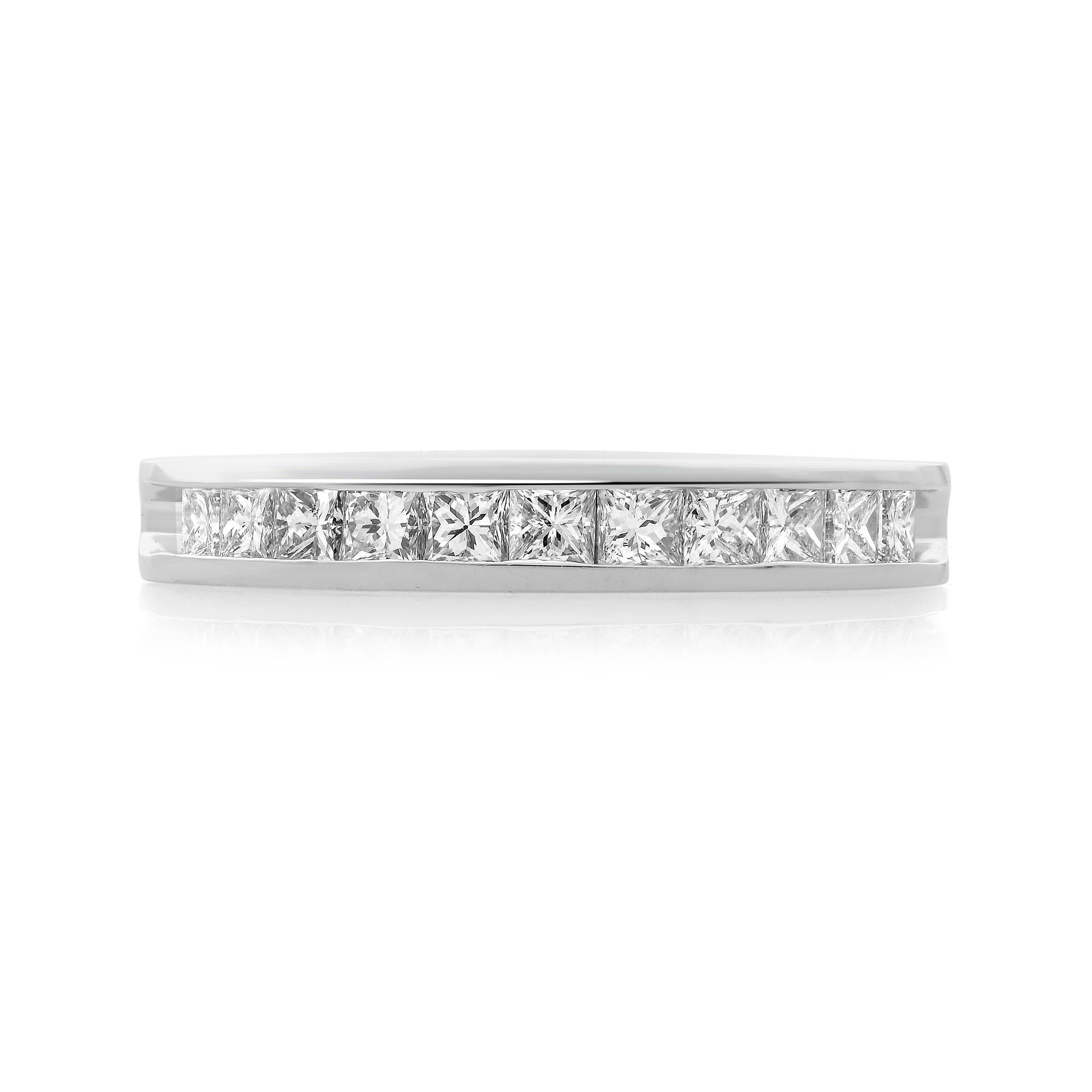 Presenting this elegant and classic wedding band crafted in platinum with 11 princess cut channel set diamonds. The total diamond carat weight is 0.50 with G color and SI1 clarity. Band width is 3.10mm. Ring size 7. Comes in a presentable gift box.
