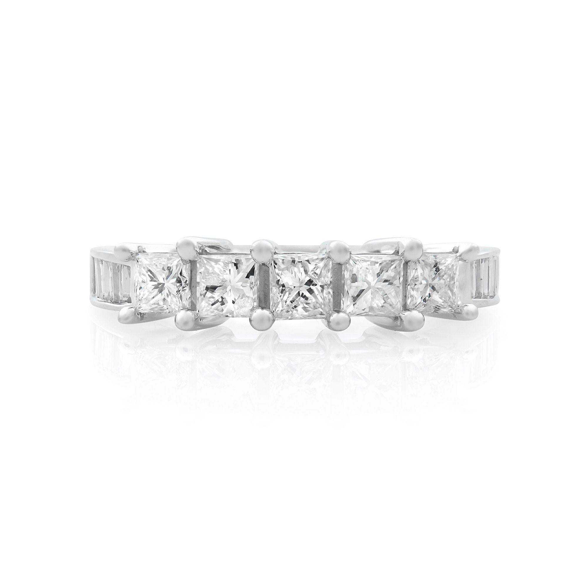 This charming anniversary ring is so simple and gorgeous. The ring is expertly handmade of 14k white gold with shiny polish. This ring is beautifully accented with five white princess cut diamonds and baguettes weighting aprox. 1.15 carat in total.