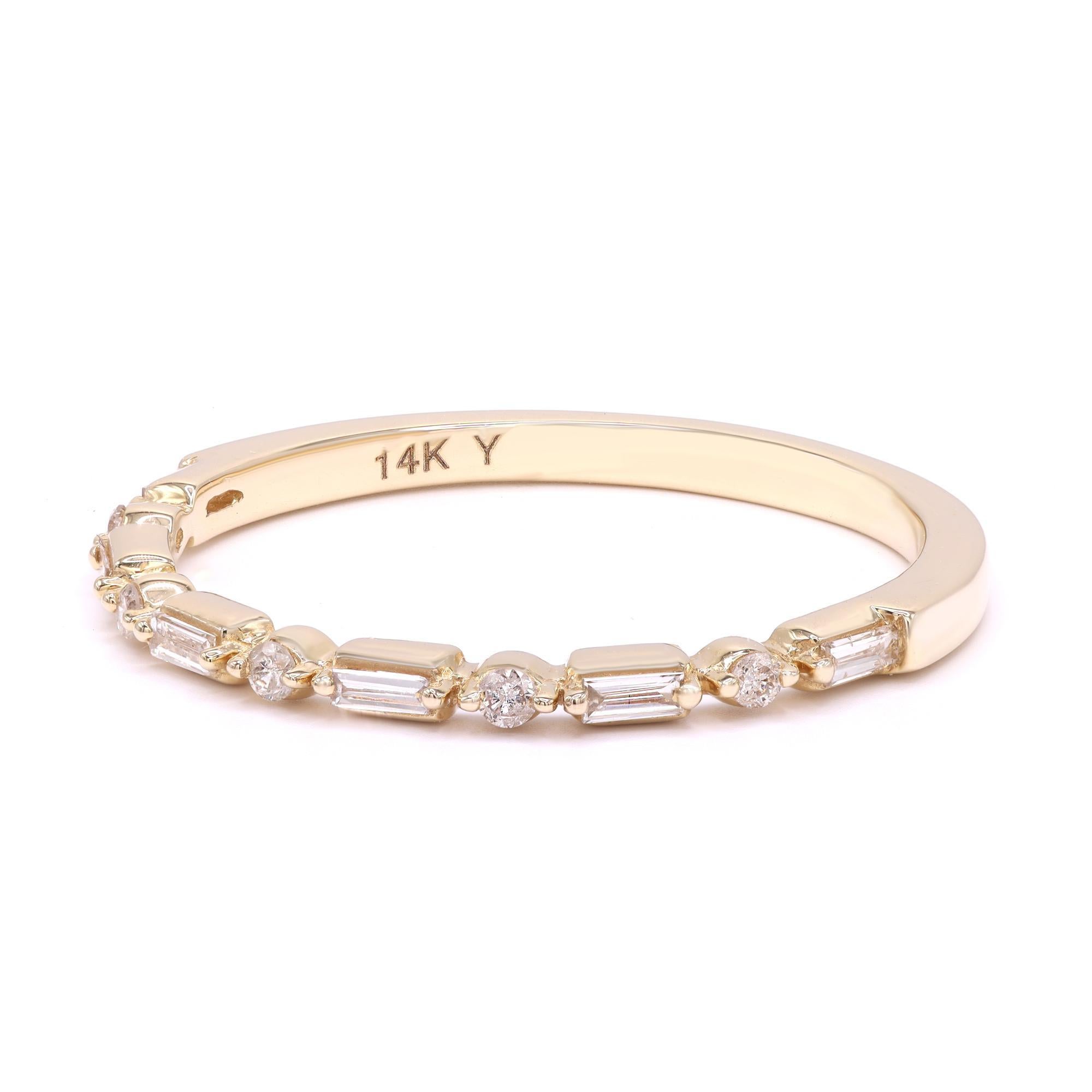 This beautiful diamond ring is a perfect fit for any occasion. Crafted in 14K yellow gold, it features round and baguette cut diamonds in prong setting. It's stackable and easy to mix and match. The total diamond weight is 0.154cts. Ring size 6.