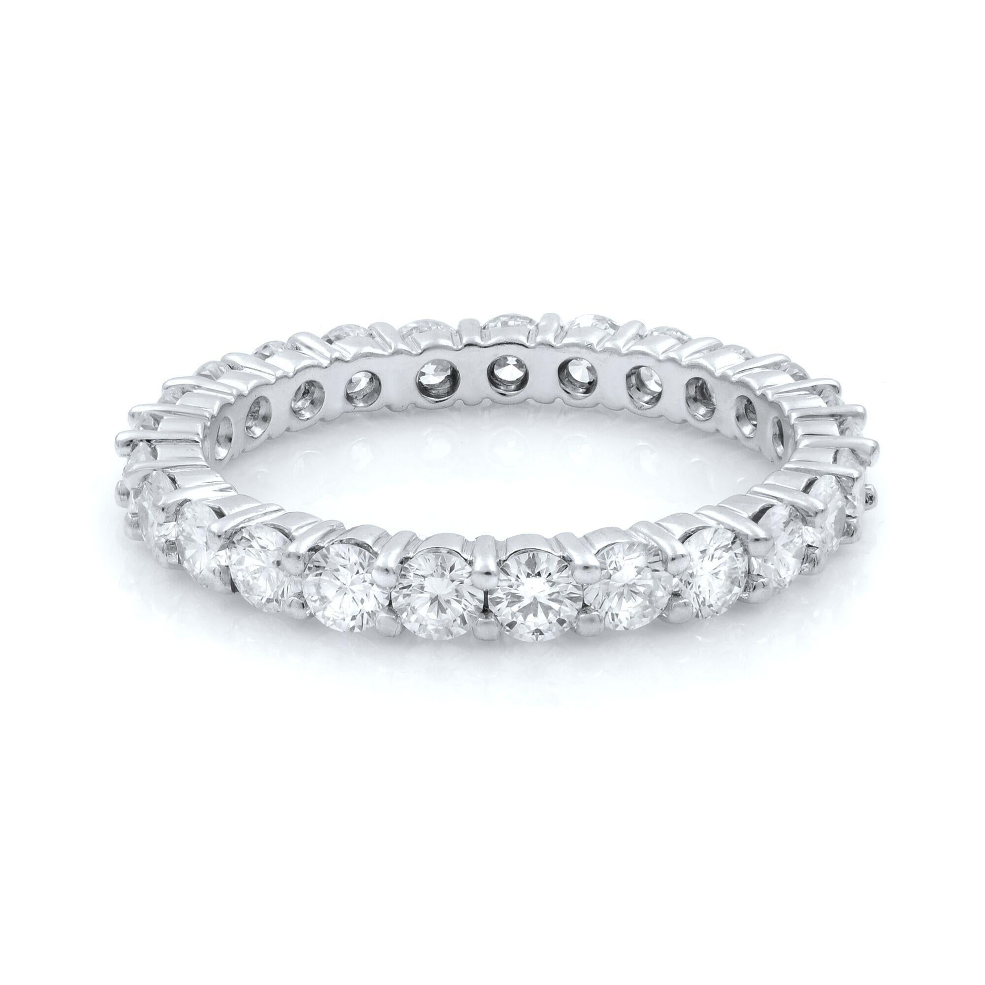 Comes with a jewelry box.This classic diamond eternity ring features round cut sparkling diamonds in a prong setting, crafted in 14K white gold band. Diamonds are totaling 1.65cts. Band width: 2.50mm. The ring weighs 2.65 grams, it is size 7. This