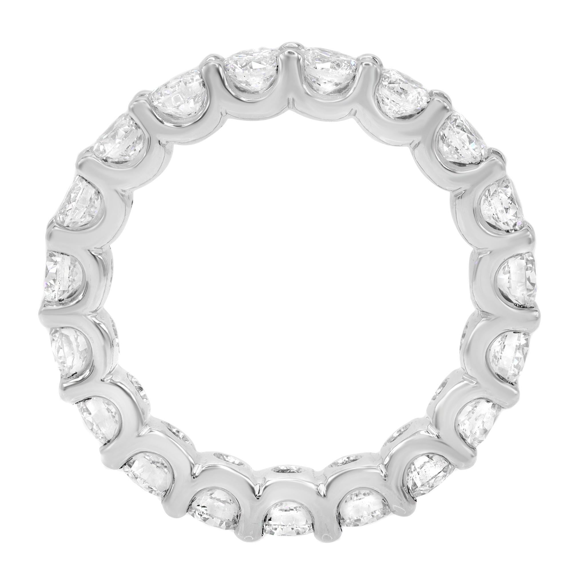  This elegant 18k white gold eternity band is illuminated with 19 brilliant white stones flooded with light as they sit inside curved u-prong settings. Total carat weight: 2.89. Diamond color F and VS clarity. Width of the ring is 3.70mm. Ring size