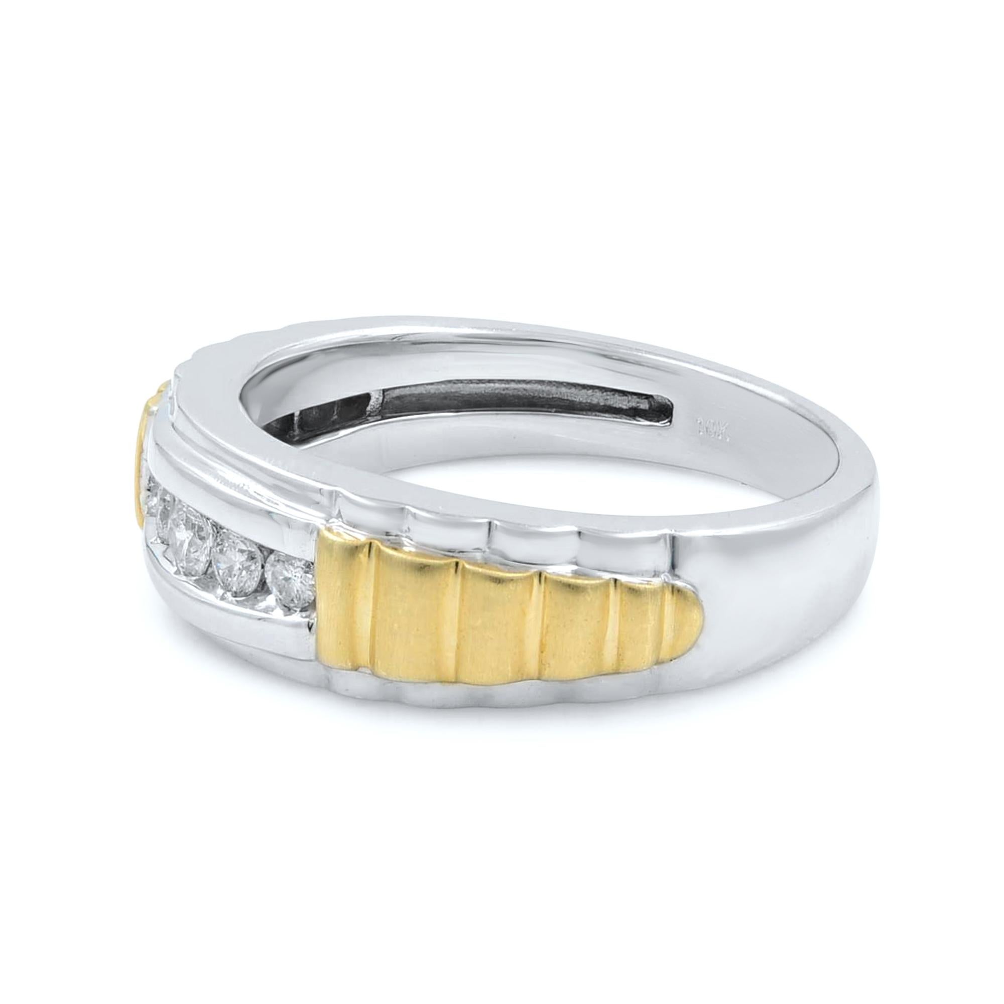 10K White and yellow gold men's diamond wedding band ring. The total carat weight of the ring is 0.40cttw. The Diamonds are channel set and are H-I Color and VS-SI clarity. Yellow gold insert layer on the sides adds a nice design touch to the ring.