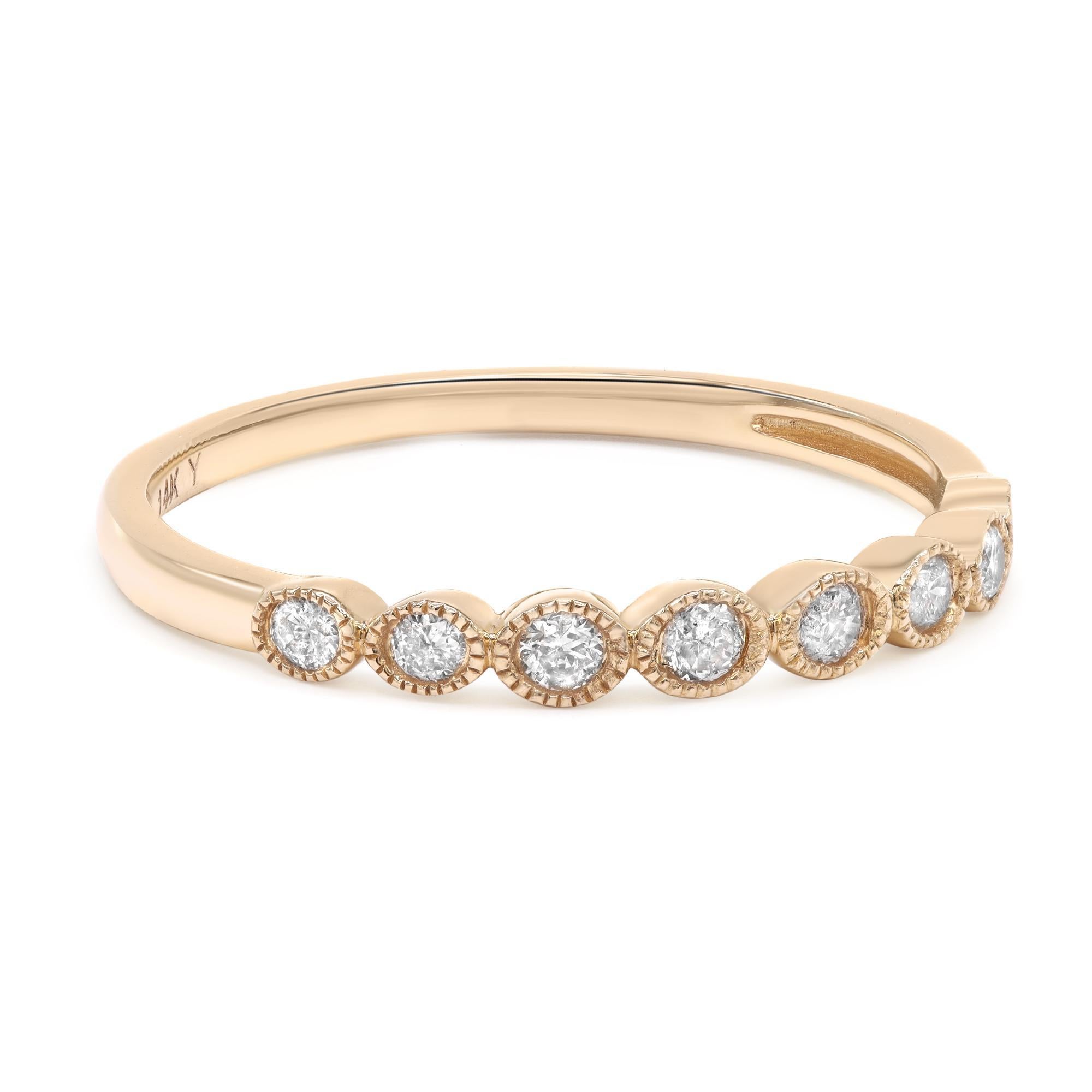 This beautiful pave set round cut diamond ring is a perfect fit for any occasion. Crafted in 14K yellow gold, it's stackable and easy to mix and match. The total diamond weight is 0.187cts. Ring size 7. Width: 2.4mm. Weight: 1.4 gms. Comes with a