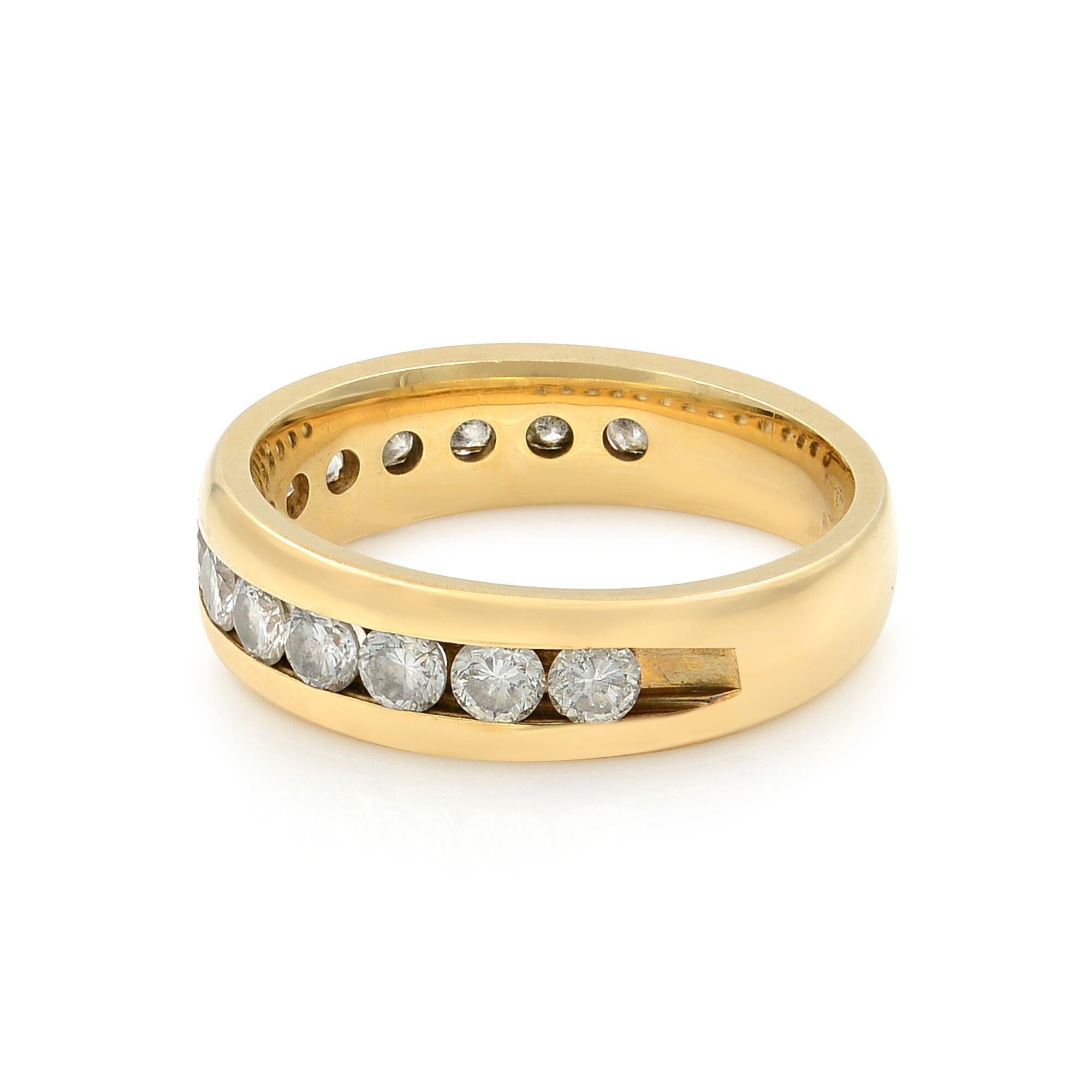 This beautiful diamond wedding ring band is crafted in 14K yellow gold. It features 14 sparkling channel set round cut diamonds with a total weight of 0.56 carats. Total weight: 4.5 grams. Ring width: 5 mm. Ring size 6. Comes with a presentable gift