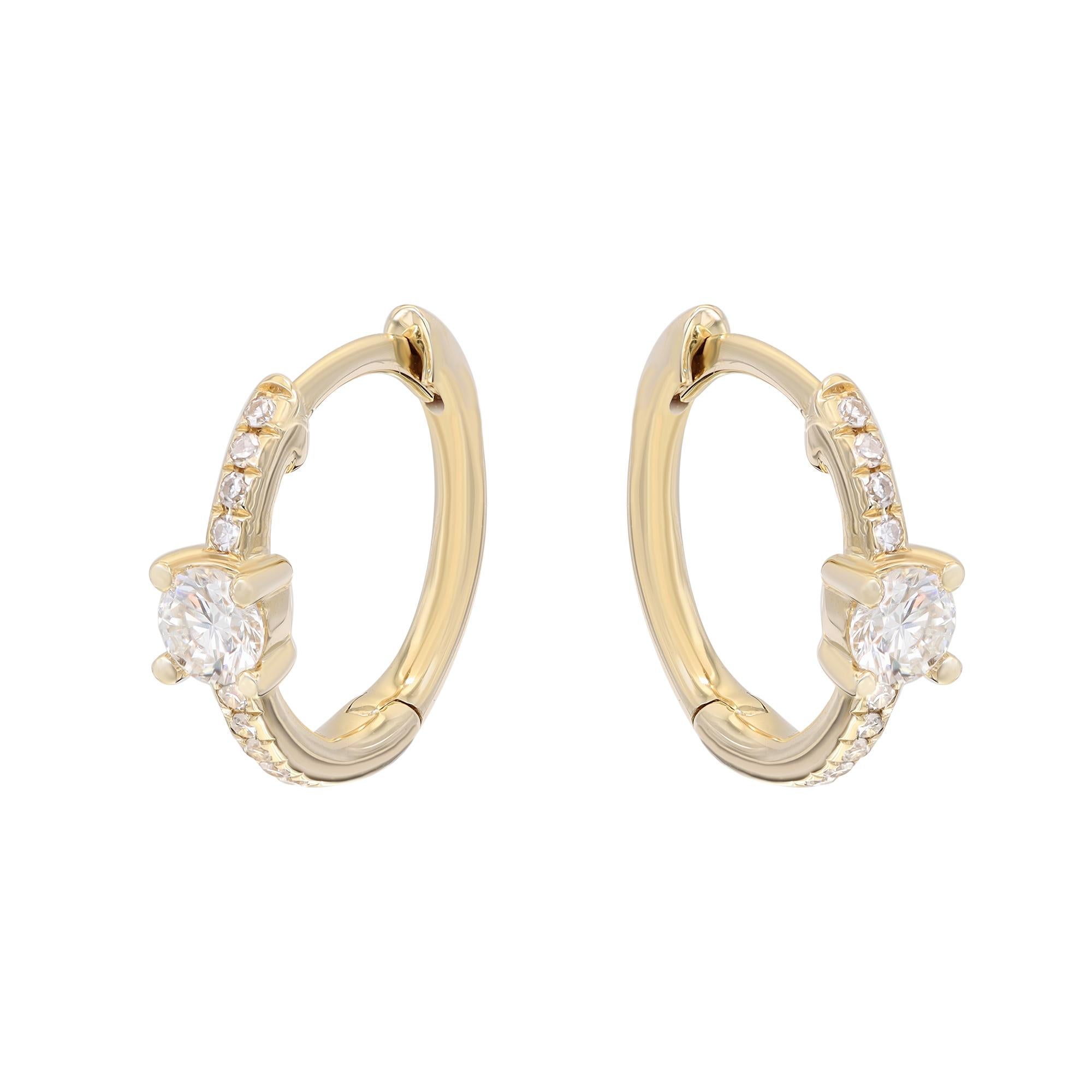 Dainty and dazzling diamond round huggie earrings, perfect for a great everyday look. These earrings are crafted in fine high polished 14K yellow gold and encrusted with bright white round cut diamonds weighing 0.25 carat. Diamond color G-H and