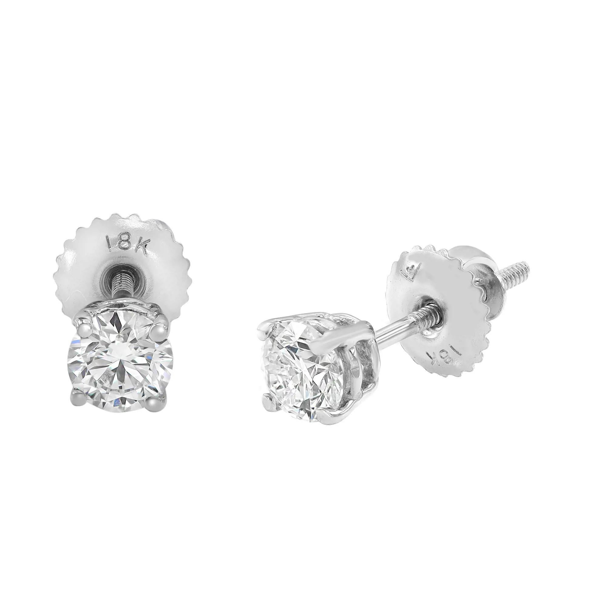 Gleaming with sparkle. Beautifully matched, these diamond stud earrings feature a total of 0.70 carat of round brilliant cut diamond pair with H color and VS2-SI1 clarity. Crafted in high polished 18k white gold with four prong setting. Always in