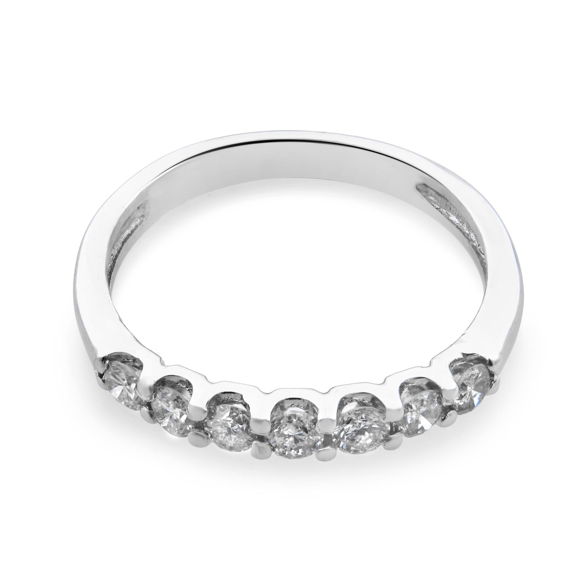 Round cut diamond wedding half eternity band in 14K white gold. There are 7 prong set diamonds approx. 0.25 carat in total. Diamond color H SI2 clarity. Band width: 2.20mm. Ring size 4.75. Comes with a presentable gift box.