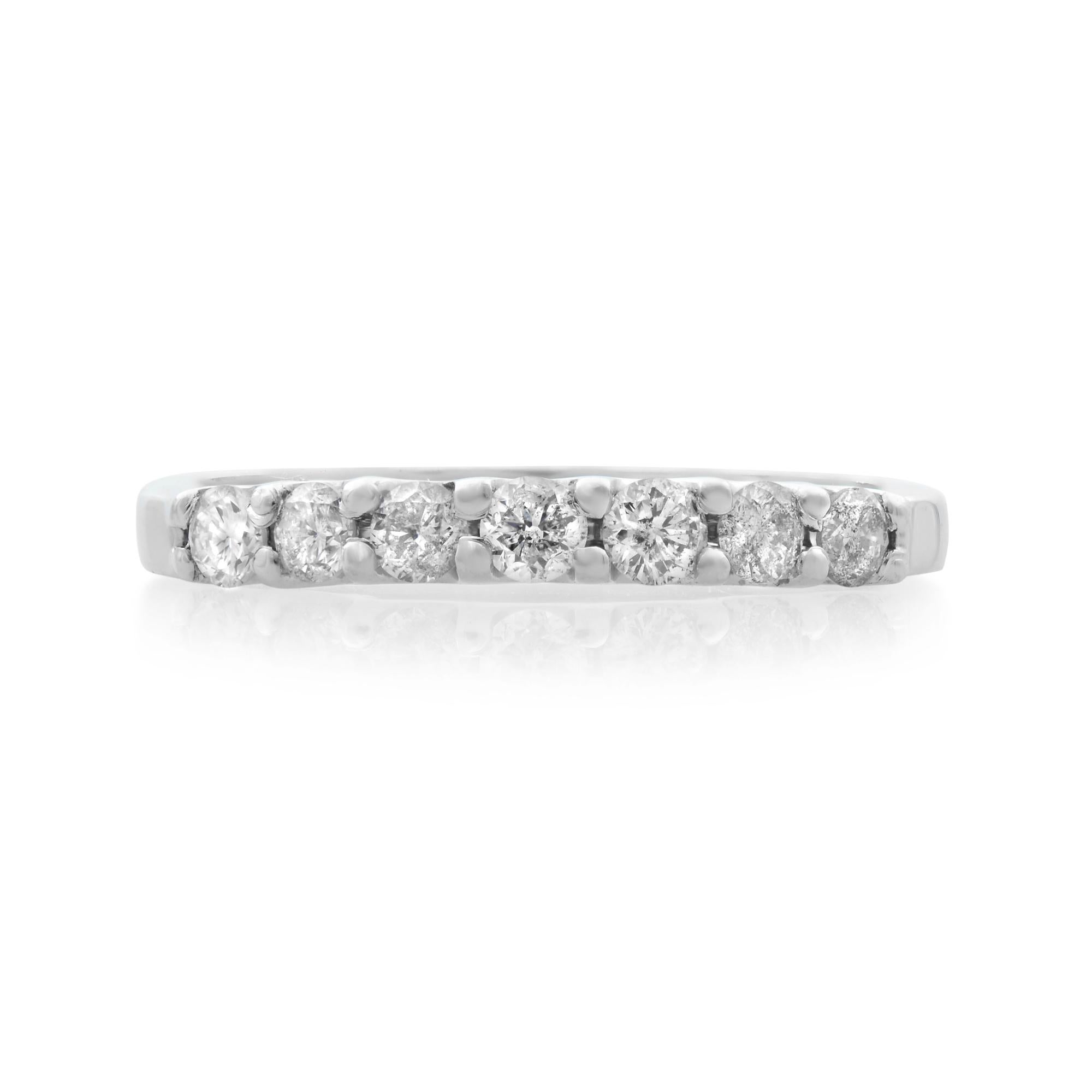 Round cut diamond wedding half eternity band in 14K white gold. There are 7 prong set diamonds approx. 0.25 carat in total. Diamond color H SI2 clarity. Band width: 2.20mm. Ring size 4.75. Comes with a presentable gift box.