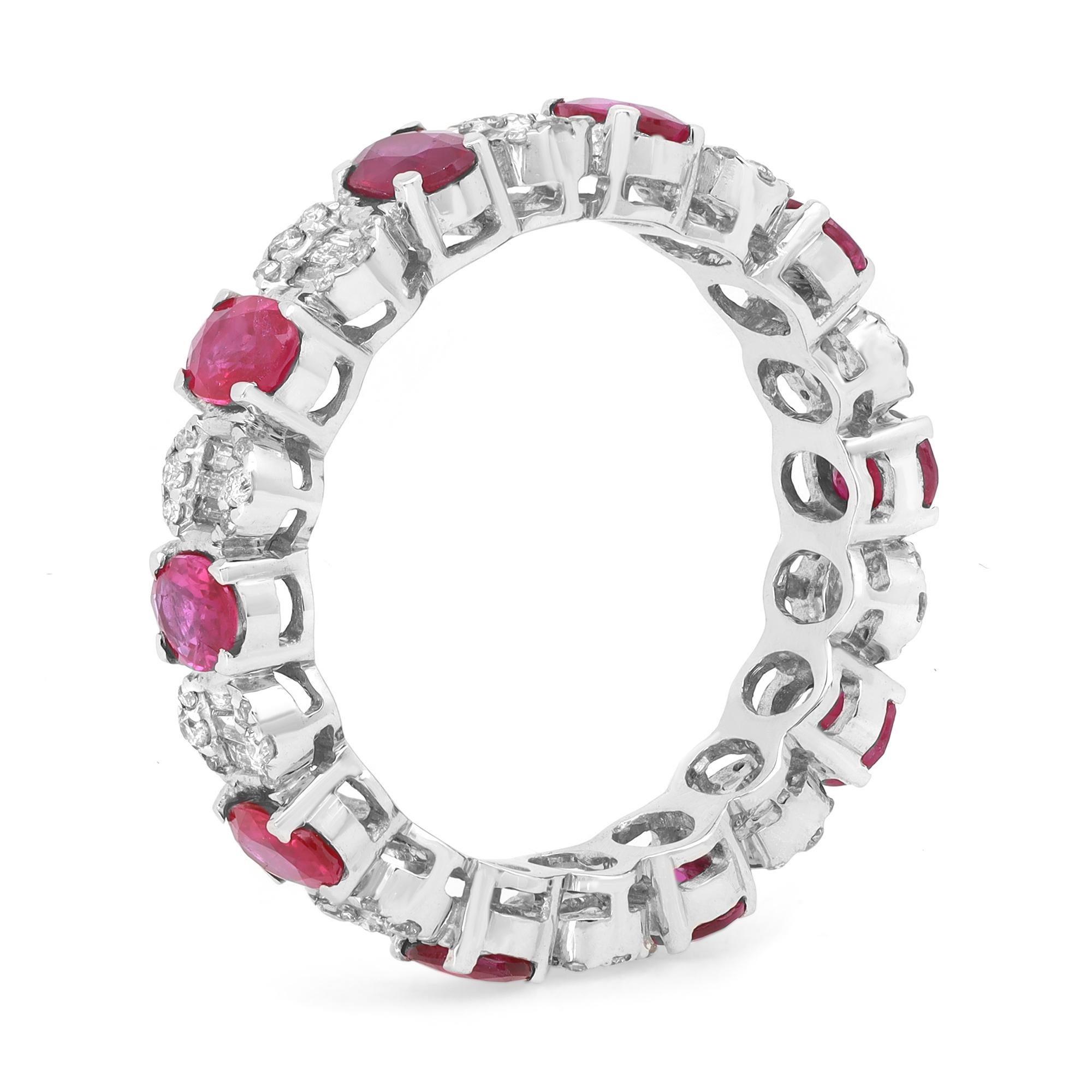 This stunning eternity band features 10 prong set oval cut rubies alternating with Baguette and Round Cut diamonds. The stones are beautifully circling all the way around the band and are set in fine 14k white gold. Ruby total carat weight: 1.83.