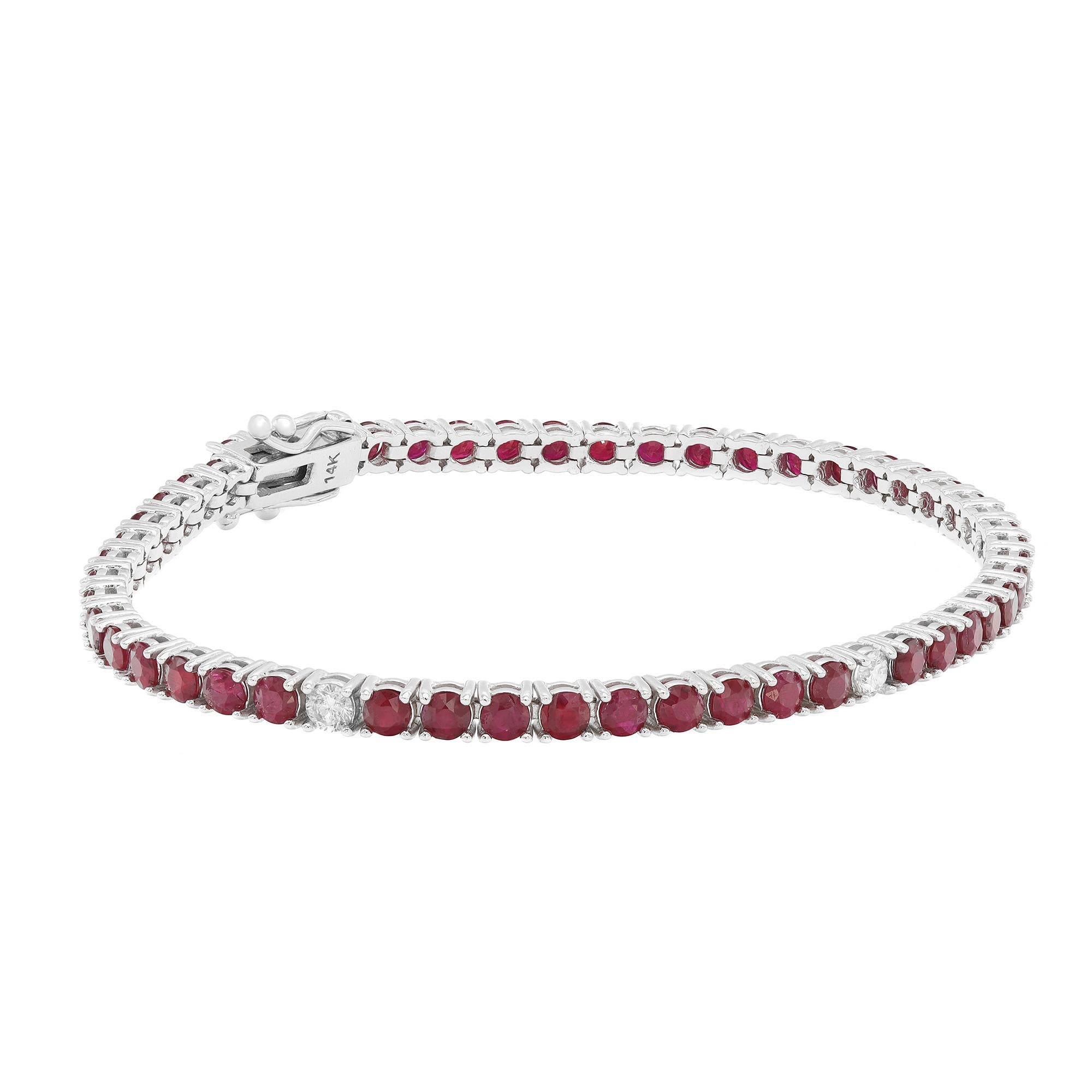 This beautifully crafted tennis bracelet features round cut Rubies and diamonds encrusted in four prong setting. Crafted in 14k white gold. Total diamond weight: 0.29 carat. Diamond Quality: G-H color and VS-SI clarity. Total Ruby weight: 6.60