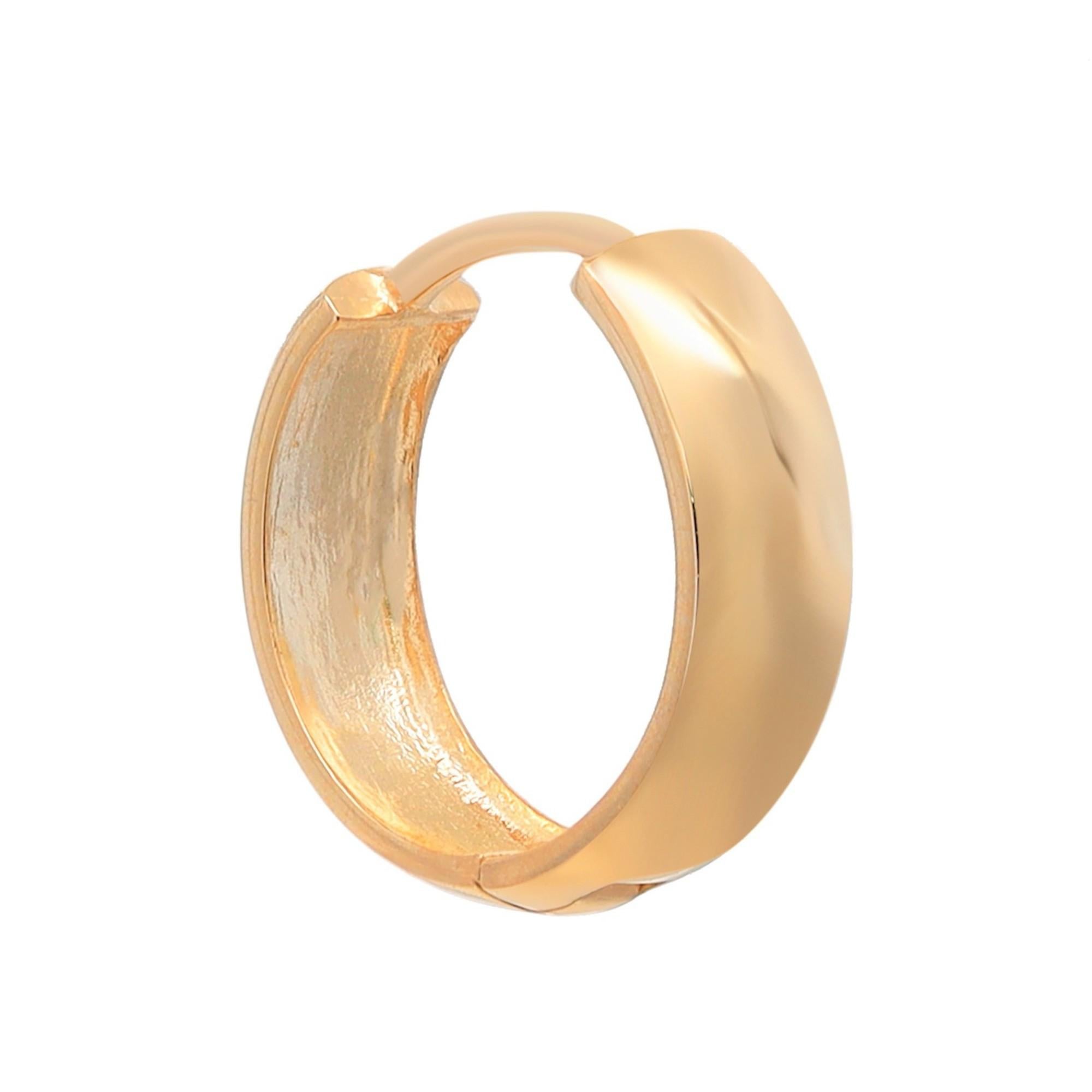 Simple, elegant yet classic, these huggie earrings are perfect for a great everyday look. Crafted in highly polished 14k yellow gold. Secured with hinged body design for easy wear. Earring length: 14mm. Width: 4.3mm. Total weight: 1.80 grams. Ideal