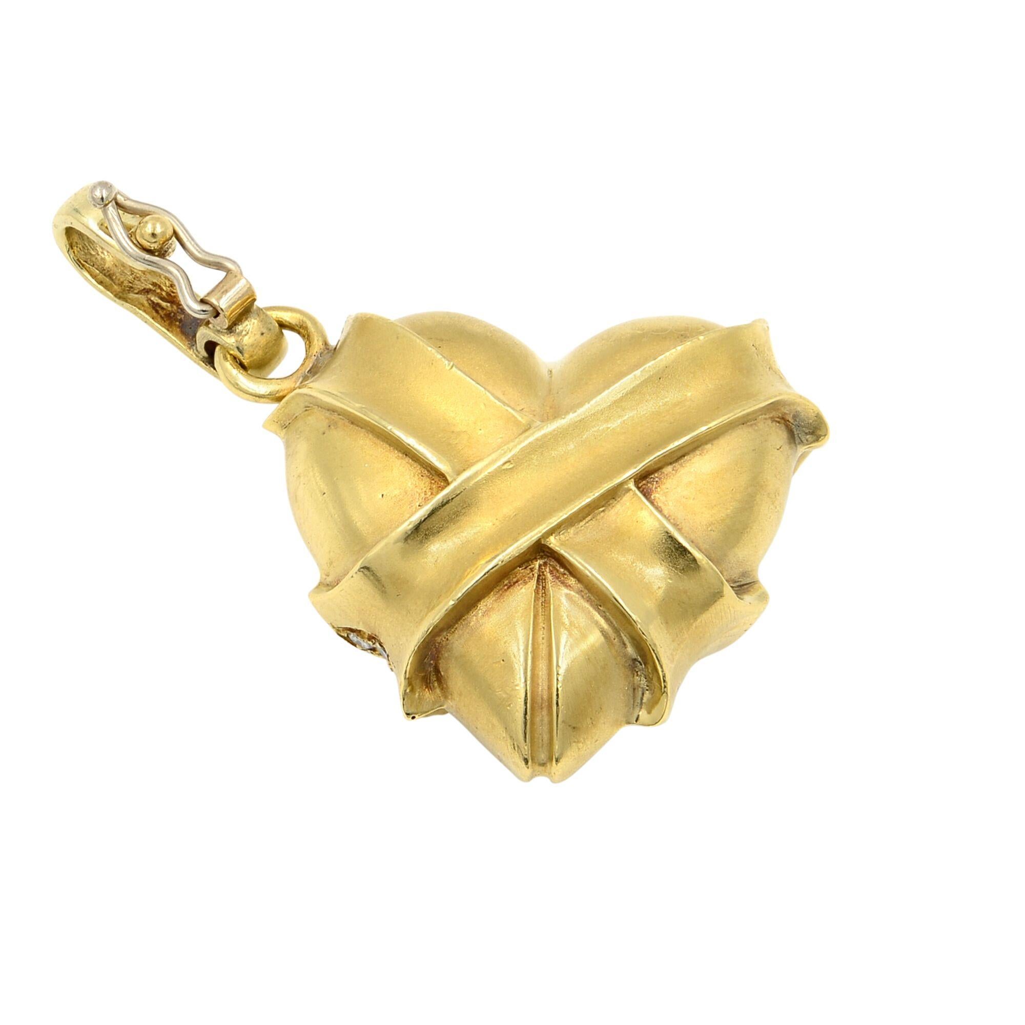 A pre-owned, excellent condition solid heart pendant with pave set round brilliant cut diamonds. Crafted in solid 14K yellow gold. Total diamond weight: 1.00 carat. Pendant size: 25mm. Total gram weight: 28.70 gms. Comes with a presentable gift box.