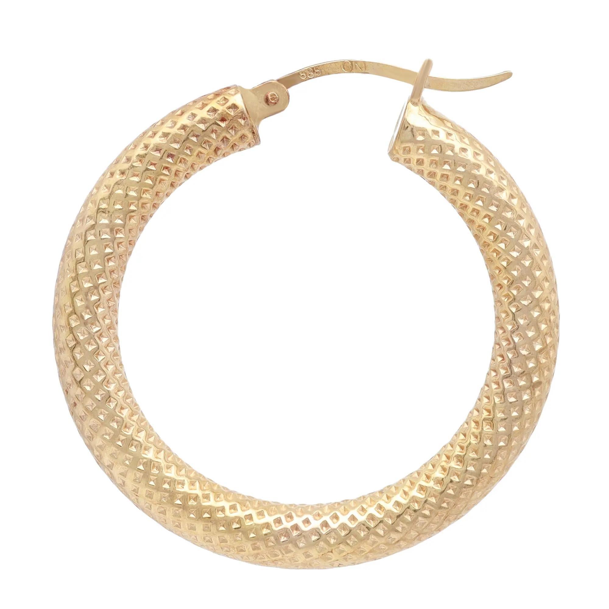 Elevate any attire with these dazzling textured hollow hoop earrings. Crafted in lustrous 14K yellow gold. Earring length: 1.1 inches. Width: 3.8mm. Total weight: 3.89 grams. Comes with a presentable gift box.
