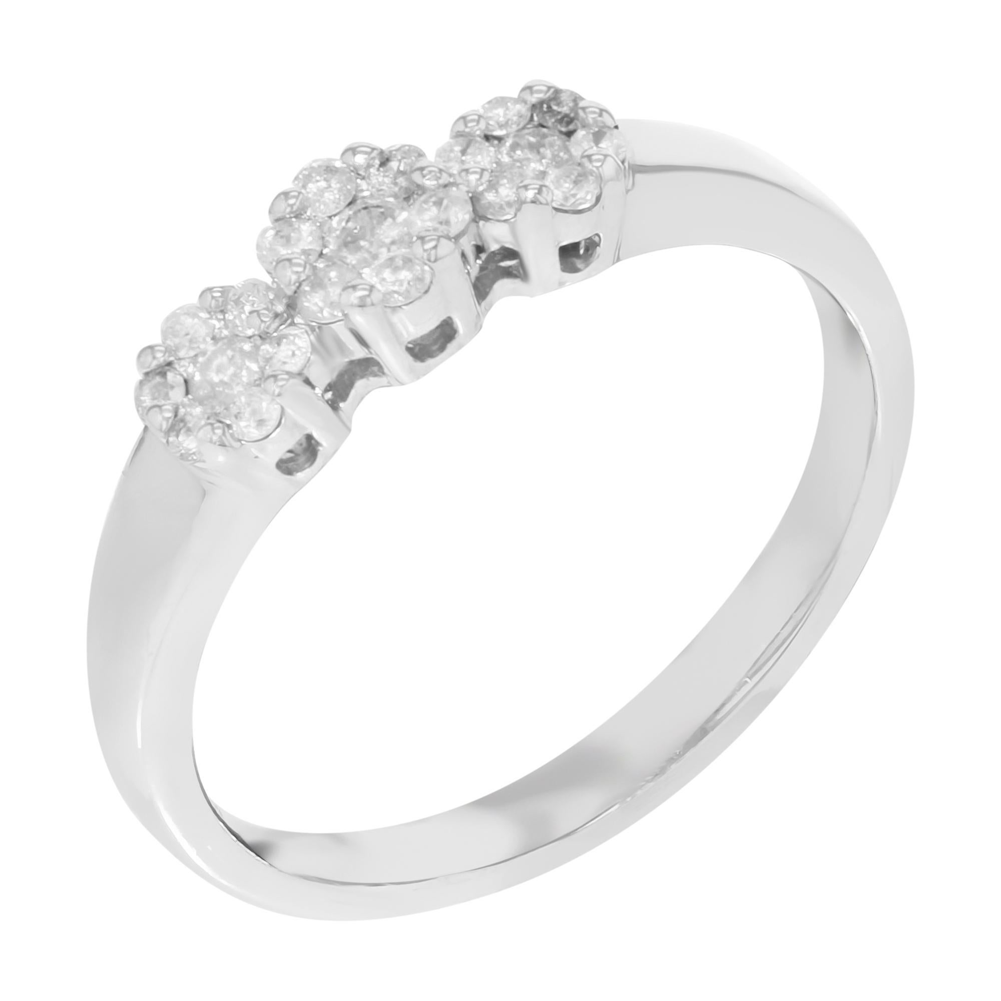 This three round cluster ring is crafted in 14k white gold and encrusted with approx. 0.37cttw diamonds. The size of the ring is 7, with a total weight of 2.3 gms. Brilliant round cut diamonds spread elegantly across the finger. Three round cluster