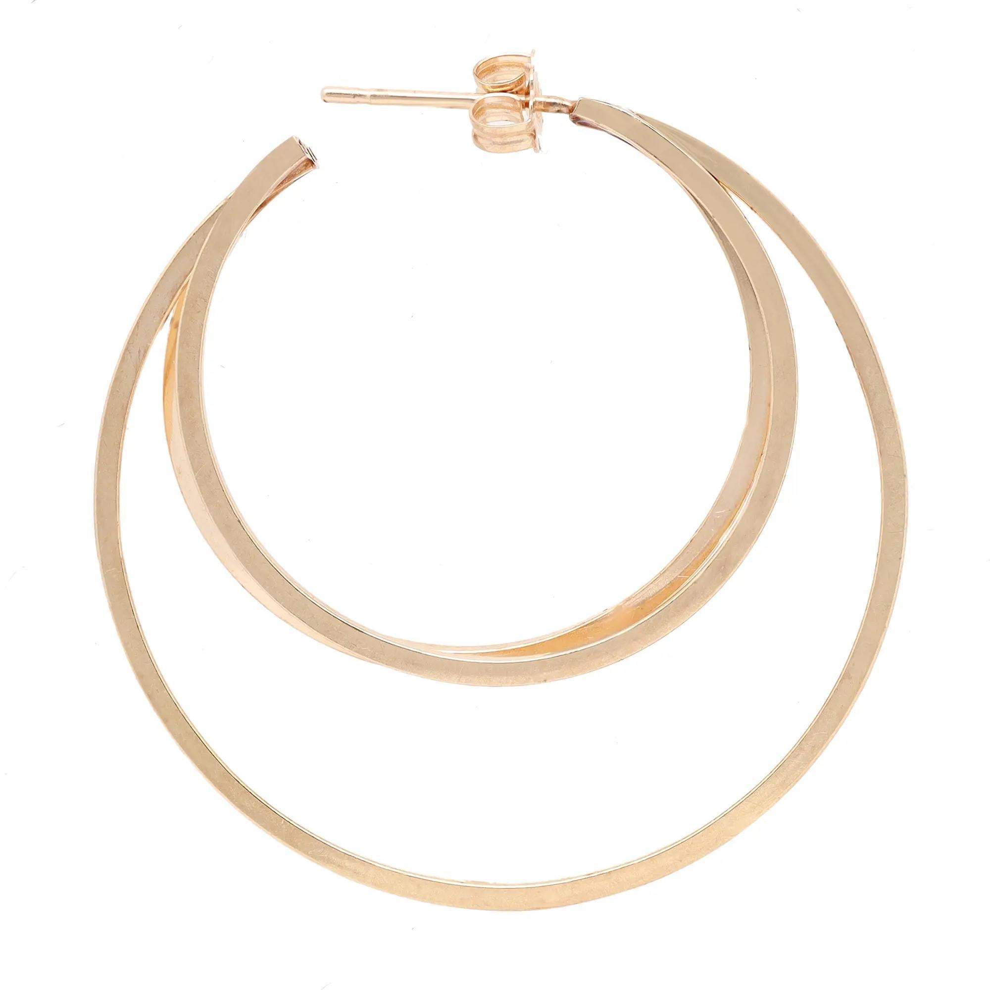 Elevate any attire with these dazzling three rows hoop earrings. Crafted in lustrous 14K yellow gold. Earring length: 1.5 inches. Total weight: 4.76 grams. Secured with push back closure. Comes with a presentable gift box.
